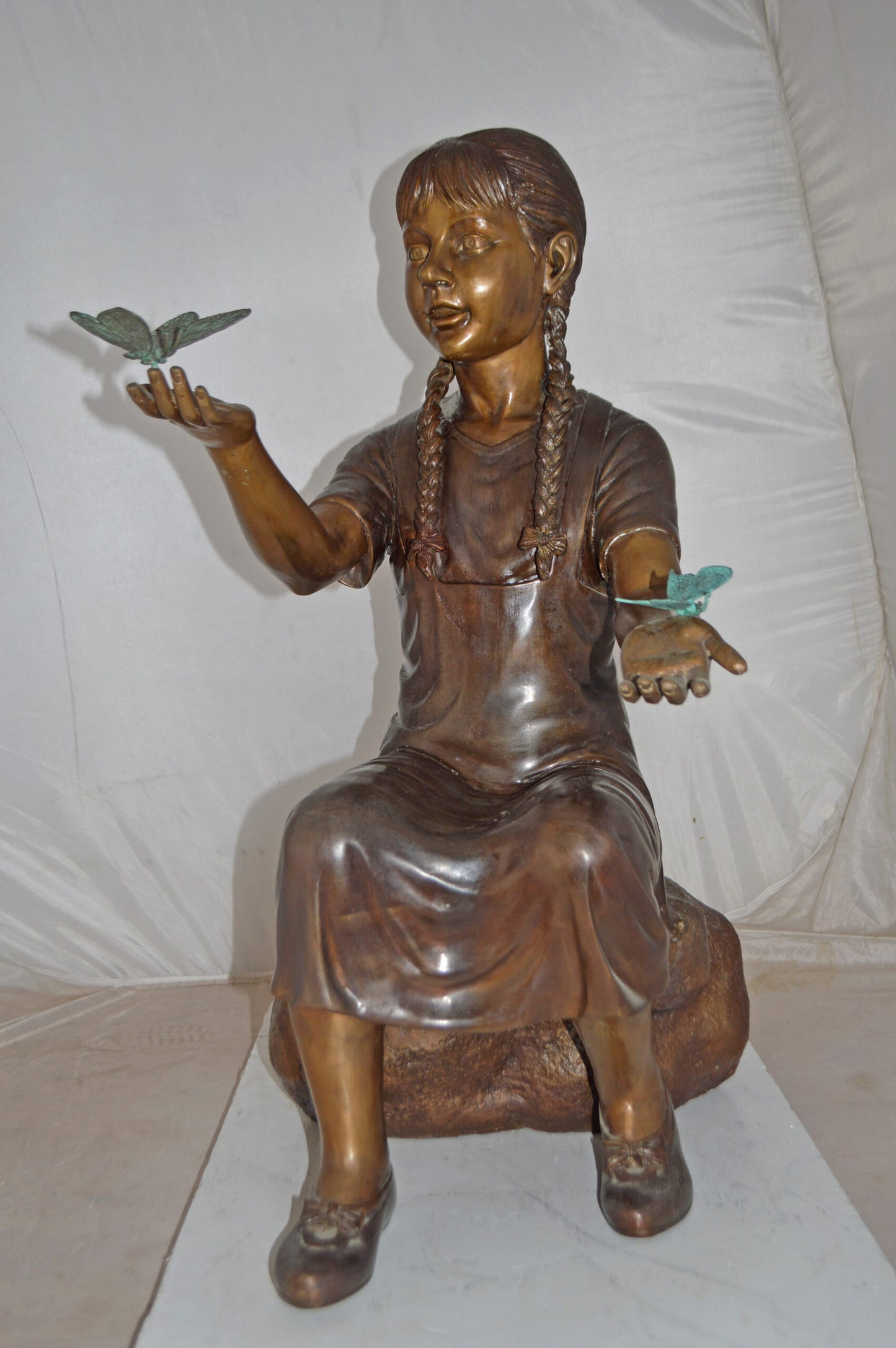 Girl Sitting on A Rock Holding Butterflies Bronze Statue - Size: 26"x17"x34"H