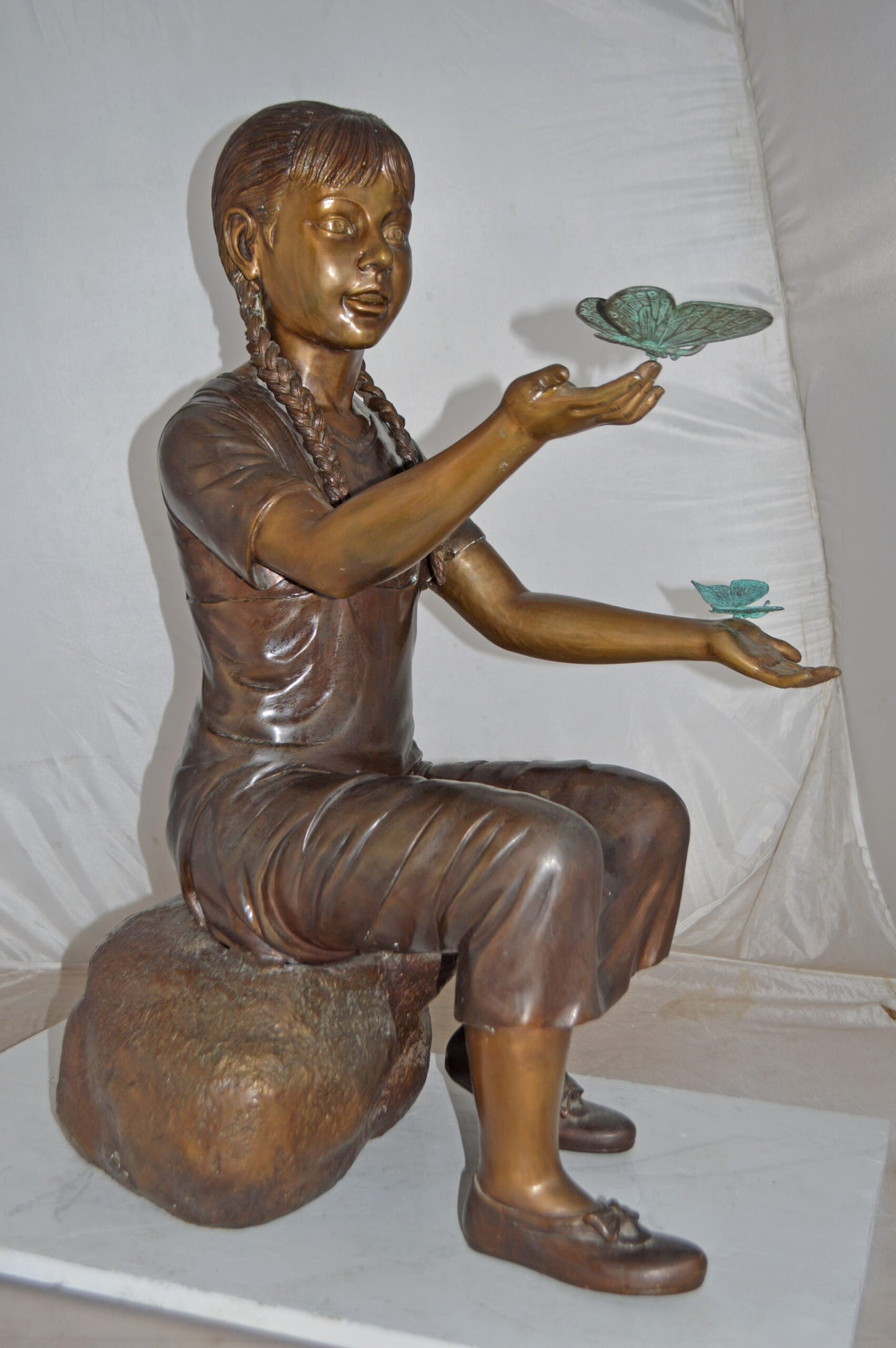 Girl Sitting on A Rock Holding Butterflies Bronze Statue - Size: 26"x17"x34"H