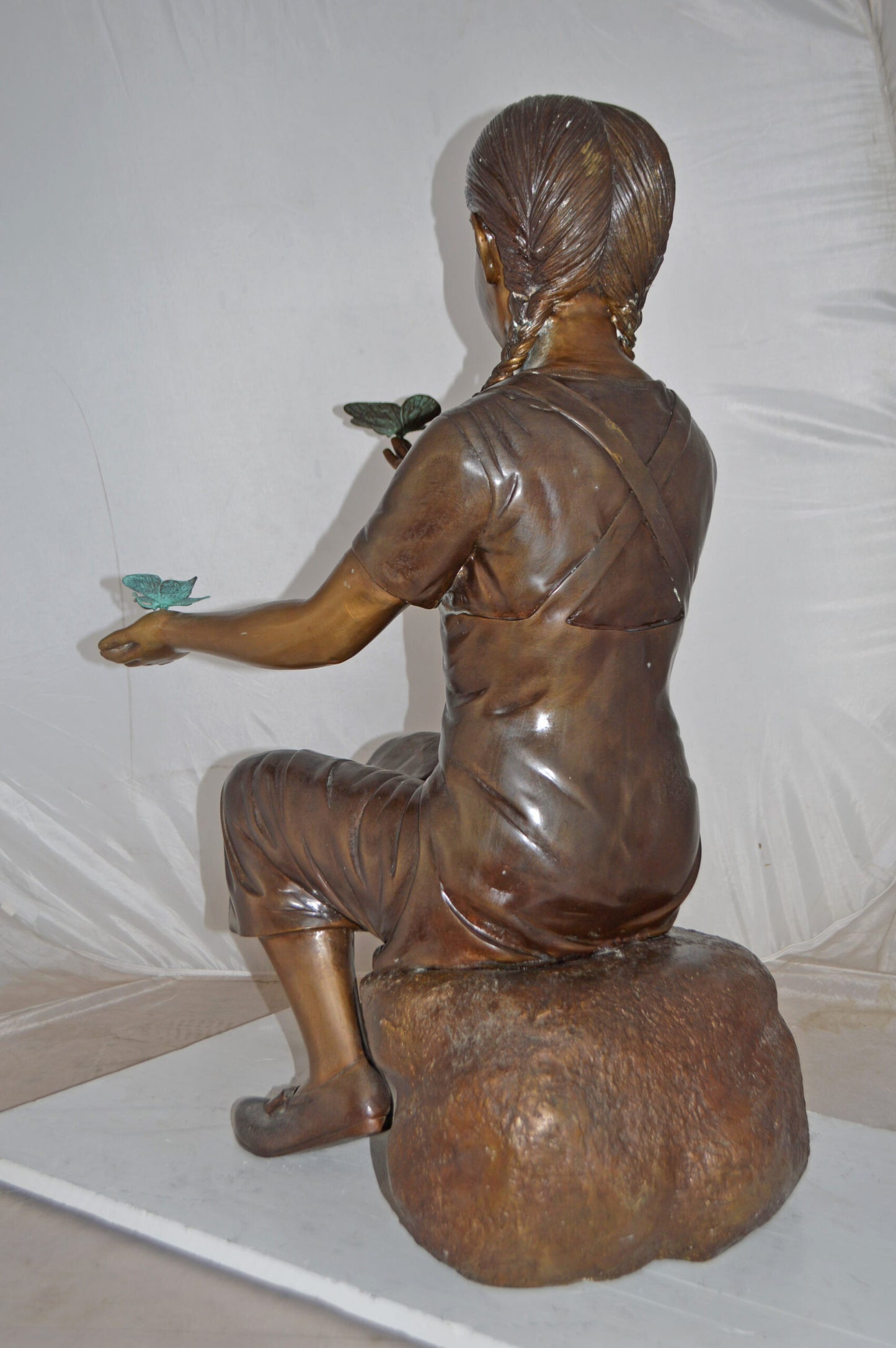 Girl Sitting on A Rock Holding Butterflies Bronze Statue - Size: 26"x17"x34"H