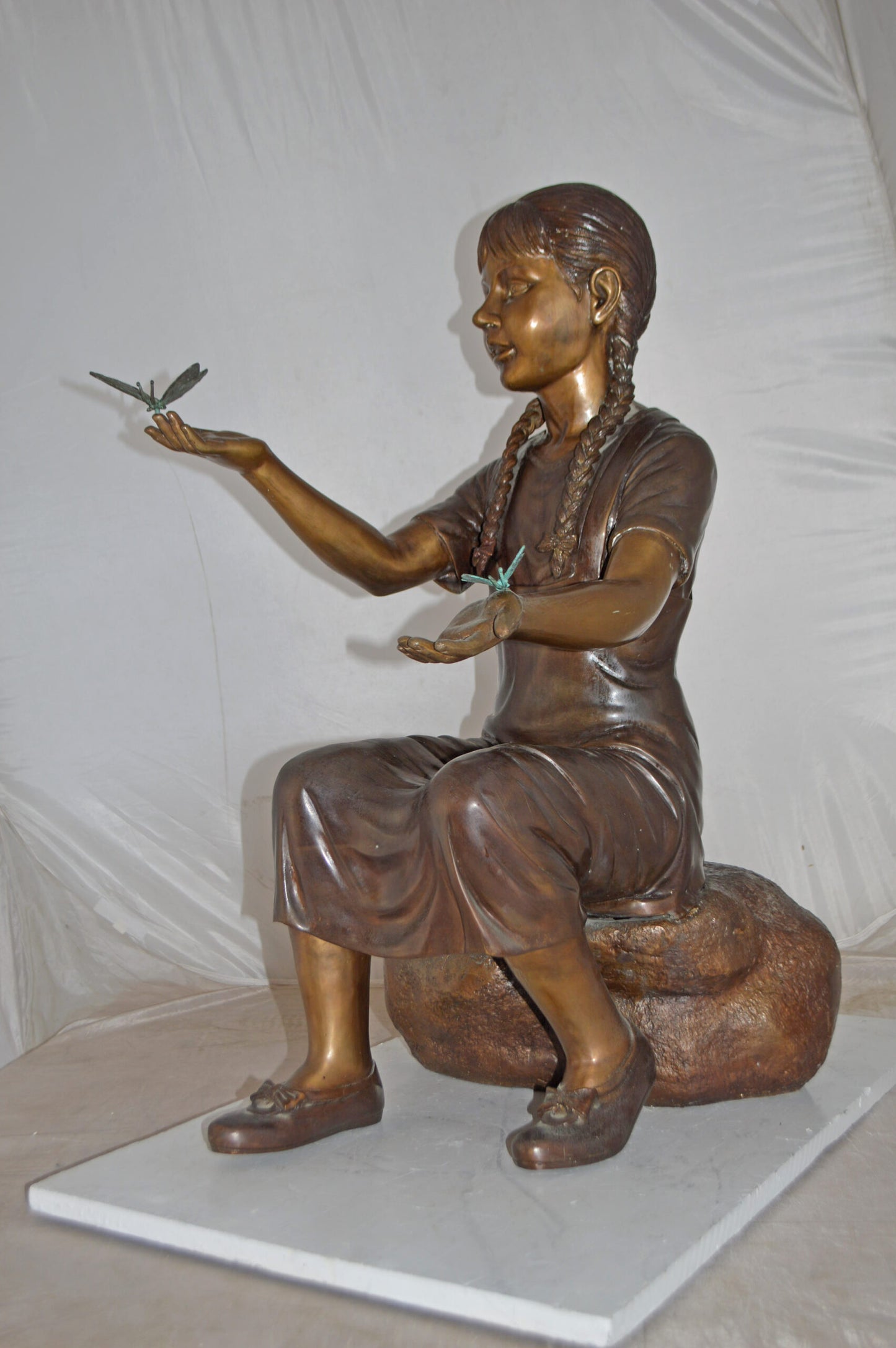 Girl Sitting on A Rock Holding Butterflies Bronze Statue - Size: 26"x17"x34"H