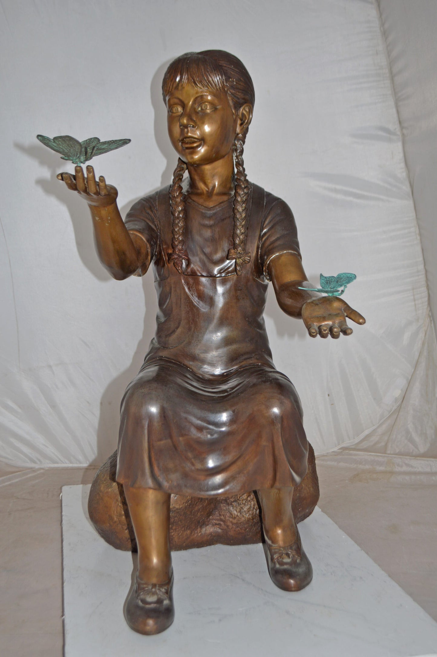 Girl Sitting on A Rock Holding Butterflies Bronze Statue - Size: 26"x17"x34"H