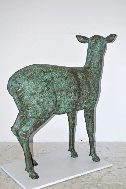 Pair of life size deer bronze statue with Green Patina - Size: 17" x 44" x 52"H.