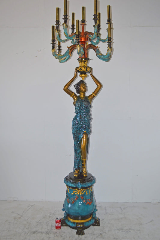 A Pair of Ladies holding a Lamp Bronze Statue - Size: 30"L x 30"W x 100"H.