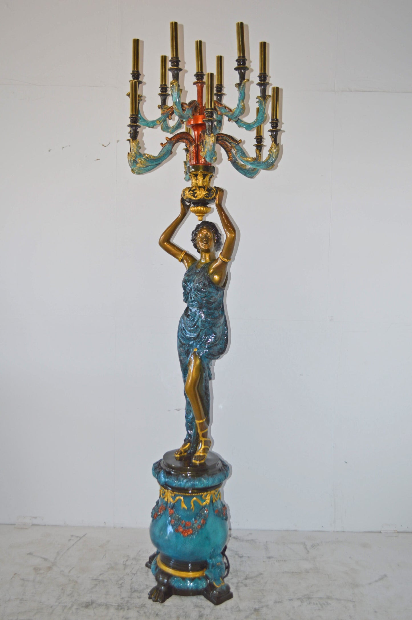 A Pair of Ladies holding a Lamp Bronze Statue - Size: 30"L x 30"W x 100"H.