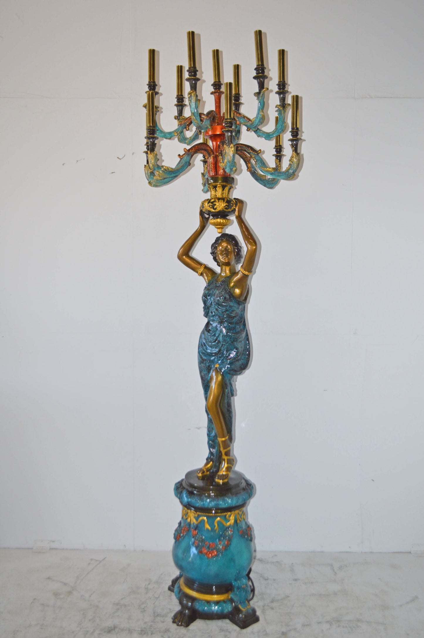 A Pair of Ladies holding a Lamp Bronze Statue - Size: 30"L x 30"W x 100"H.