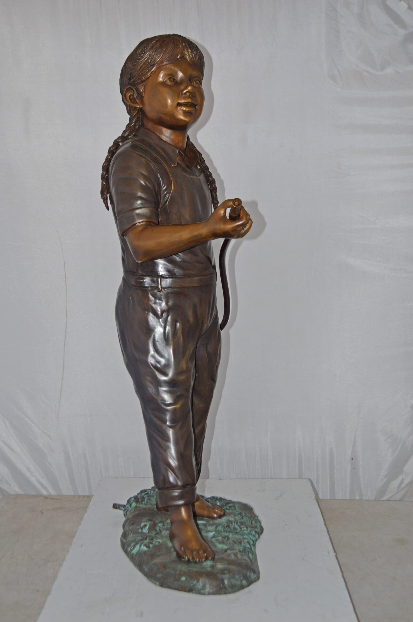 A Girl Holding A Garden Hose Bronze Statue Fountain - Size: 13"L x 20"W x 39"H.