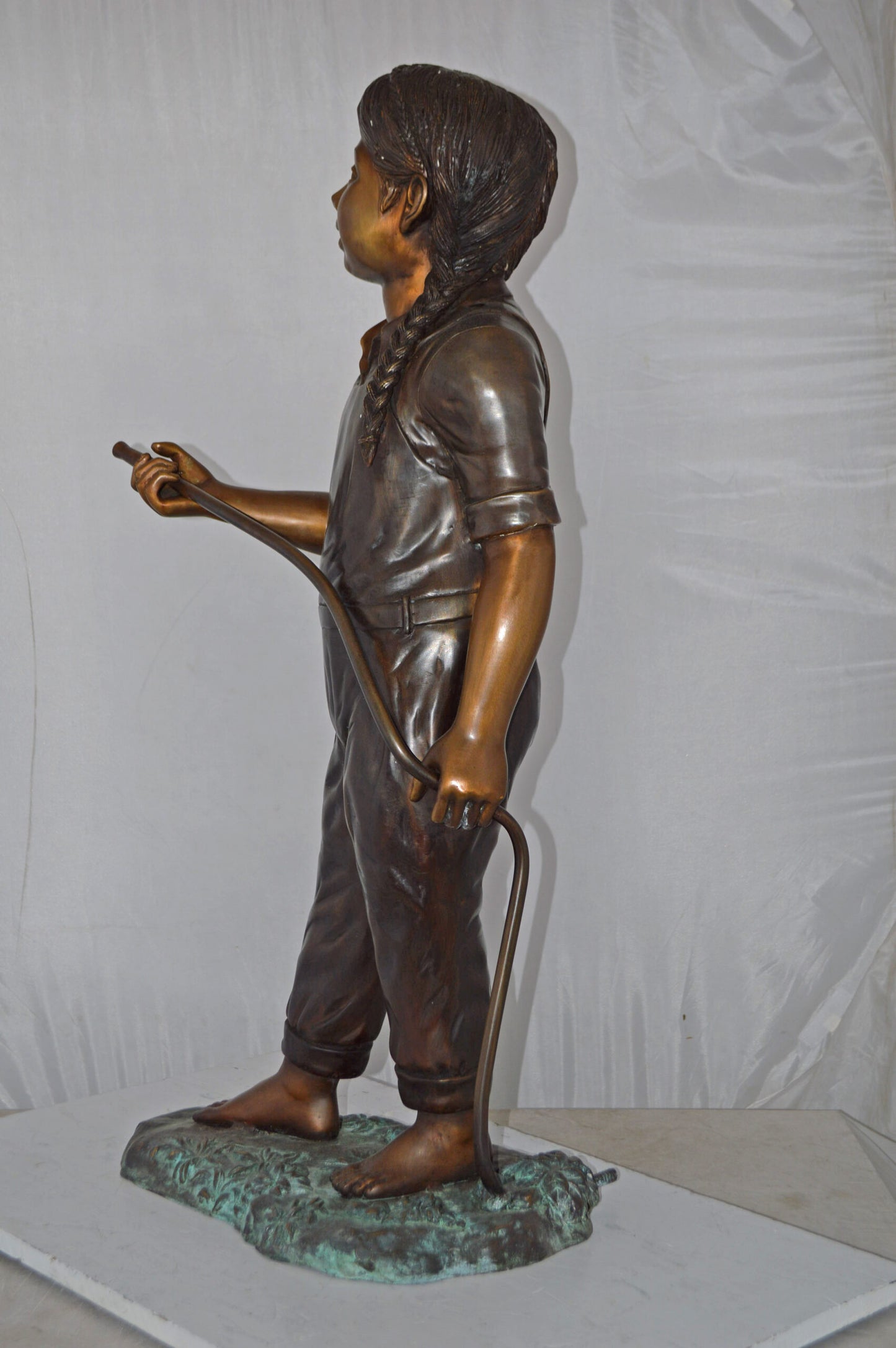 A Girl Holding A Garden Hose Bronze Statue Fountain - Size: 13"L x 20"W x 39"H.