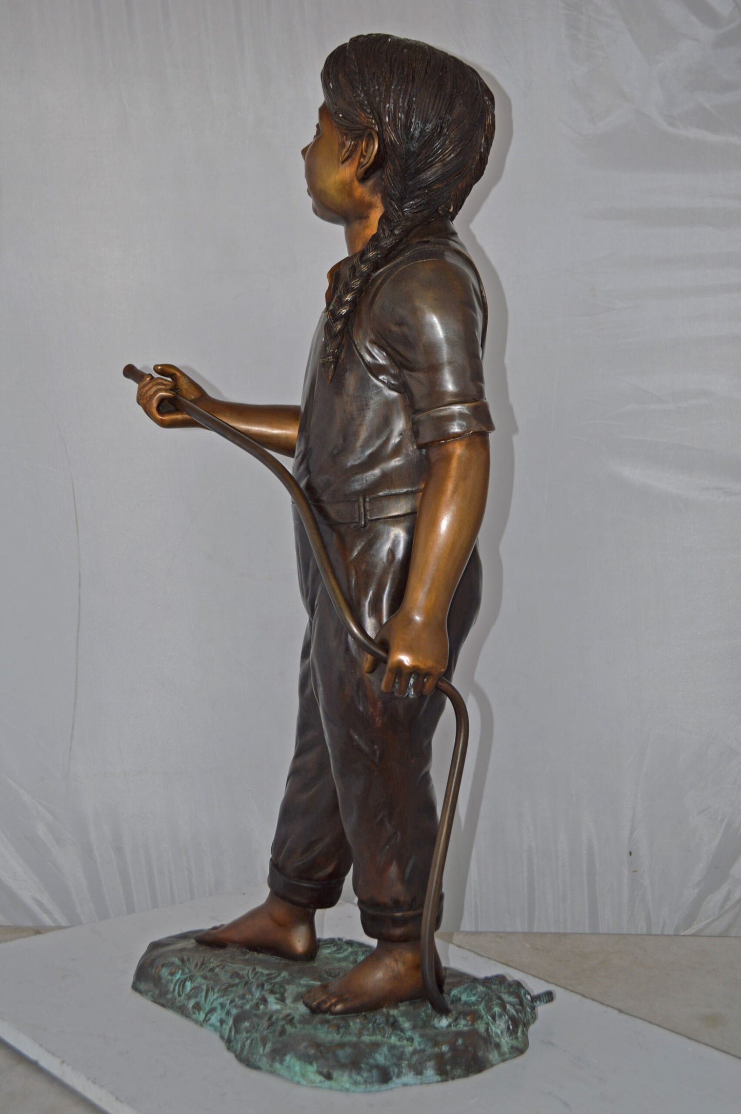 A Girl Holding A Garden Hose Bronze Statue Fountain - Size: 13"L x 20"W x 39"H.