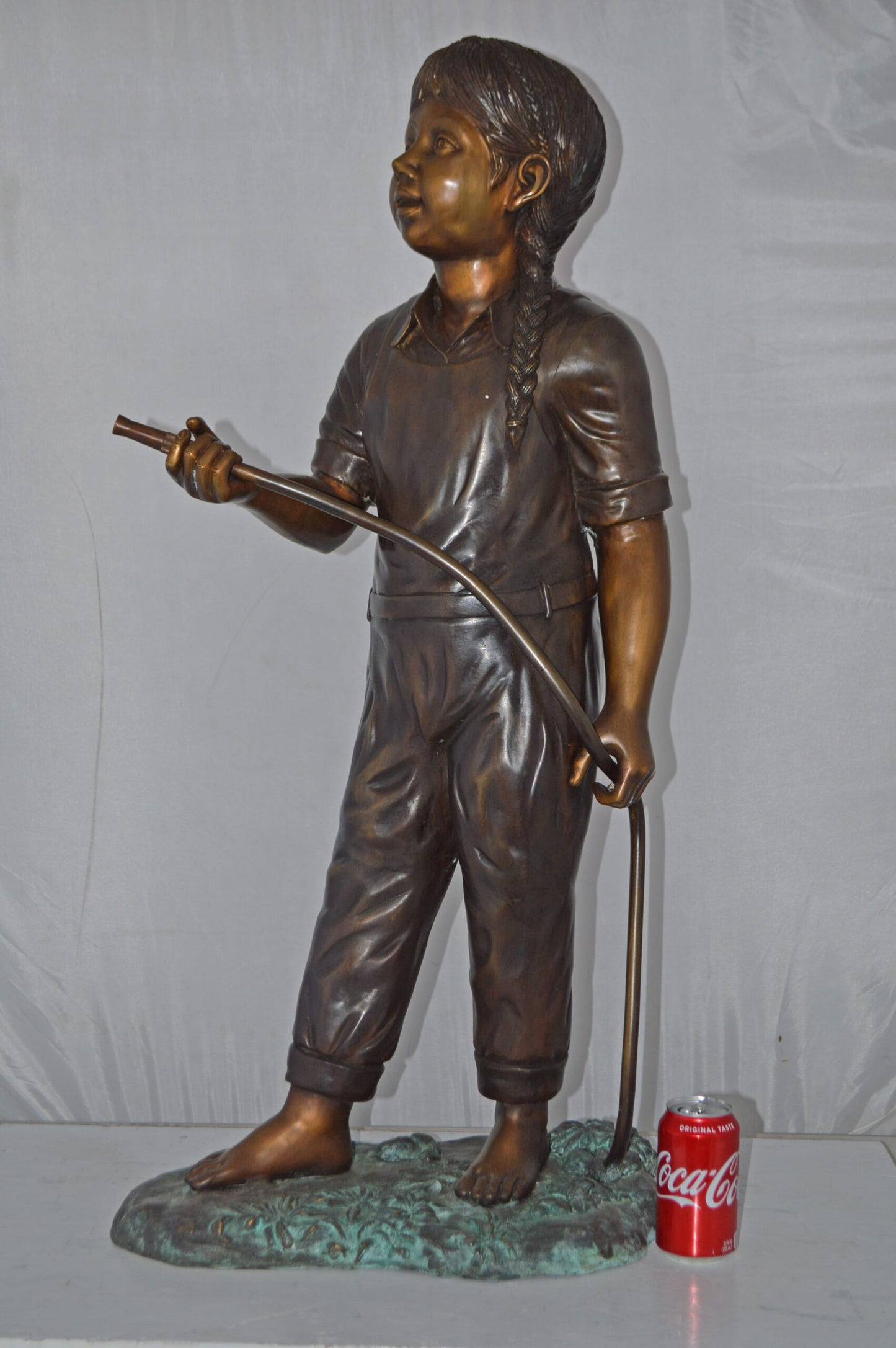 A Girl Holding A Garden Hose Bronze Statue Fountain - Size: 13"L x 20"W x 39"H.