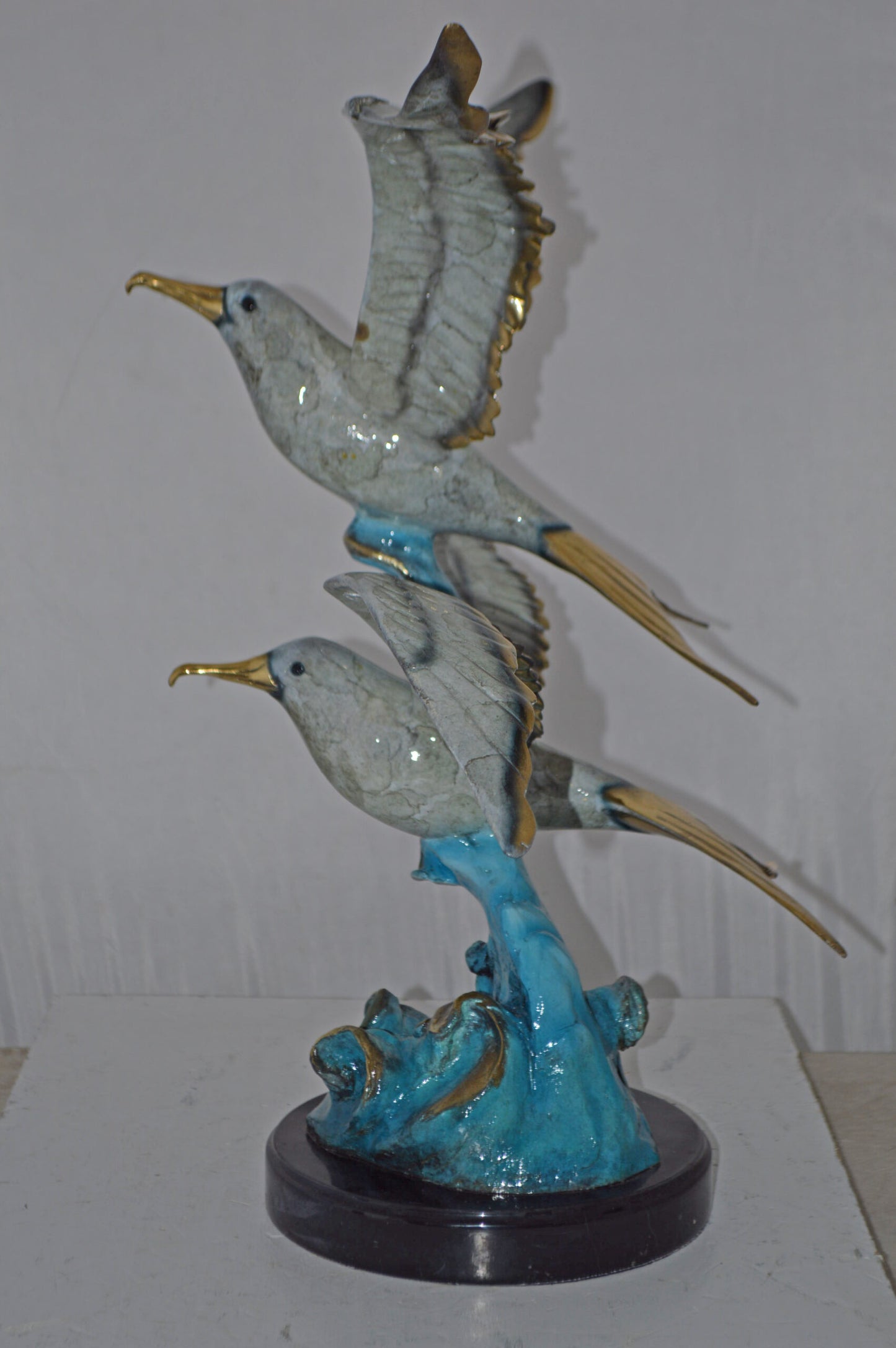 A Pair of Seagulls flying Bronze Statue Tabletop - Size: 15"L x 35"W x 26"H.