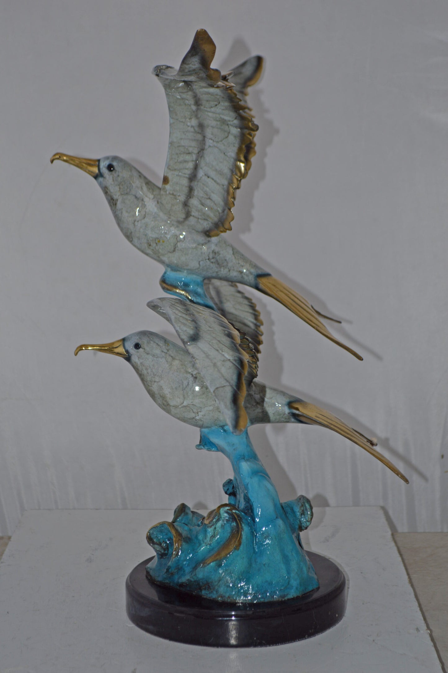 A Pair of Seagulls flying Bronze Statue Tabletop - Size: 15"L x 35"W x 26"H.