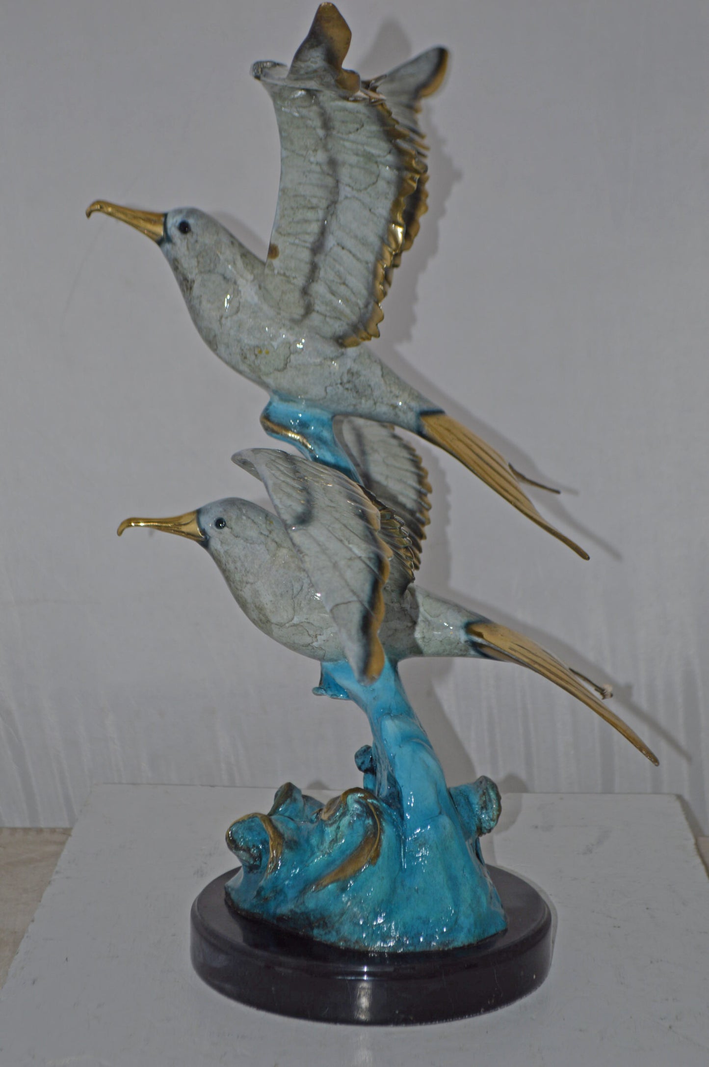 A Pair of Seagulls flying Bronze Statue Tabletop - Size: 15"L x 35"W x 26"H.