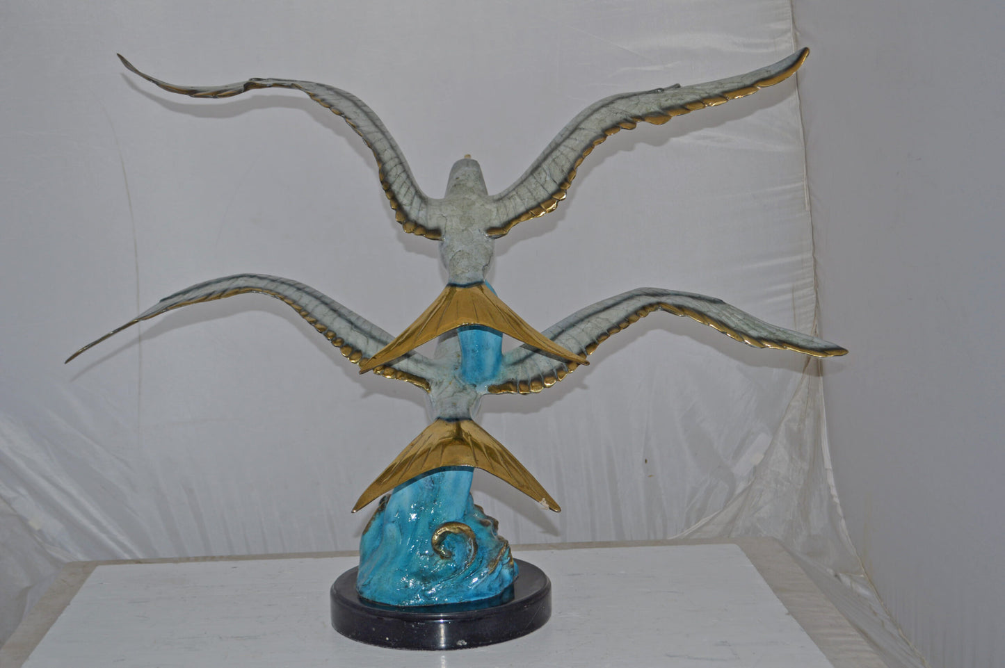 A Pair of Seagulls flying Bronze Statue Tabletop - Size: 15"L x 35"W x 26"H.