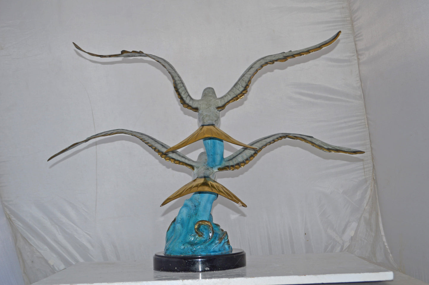A Pair of Seagulls flying Bronze Statue Tabletop - Size: 15"L x 35"W x 26"H.