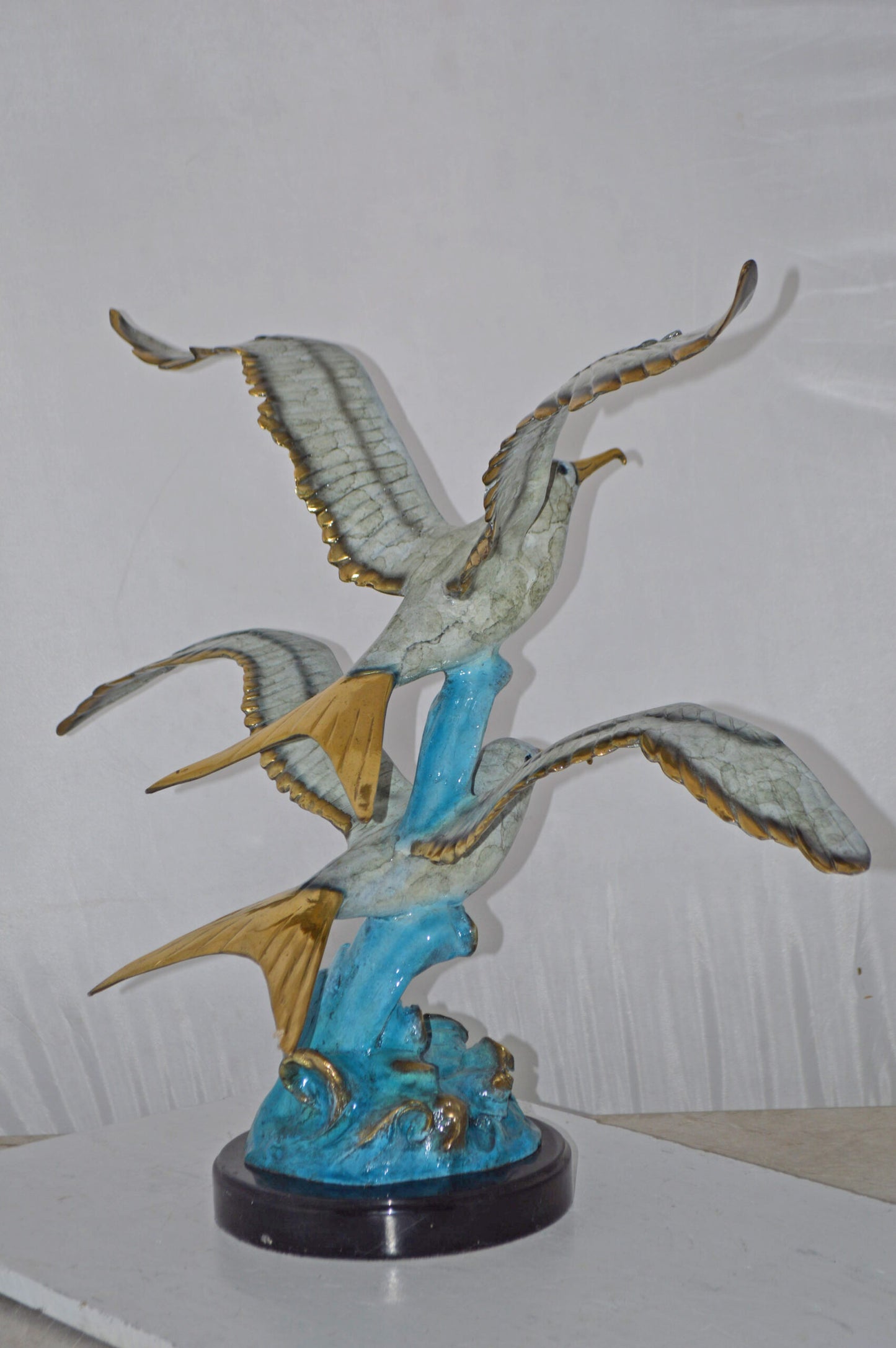 A Pair of Seagulls flying Bronze Statue Tabletop - Size: 15"L x 35"W x 26"H.
