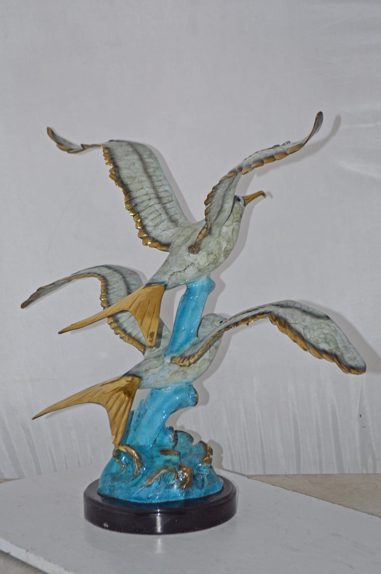 A Pair of Seagulls flying Bronze Statue Tabletop - Size: 15"L x 35"W x 26"H.