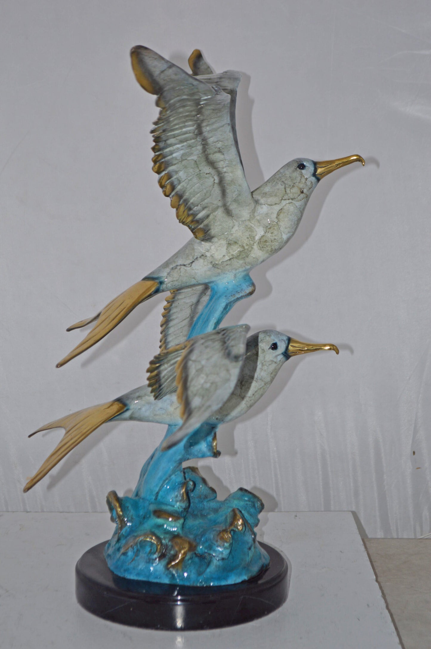 A Pair of Seagulls flying Bronze Statue Tabletop - Size: 15"L x 35"W x 26"H.