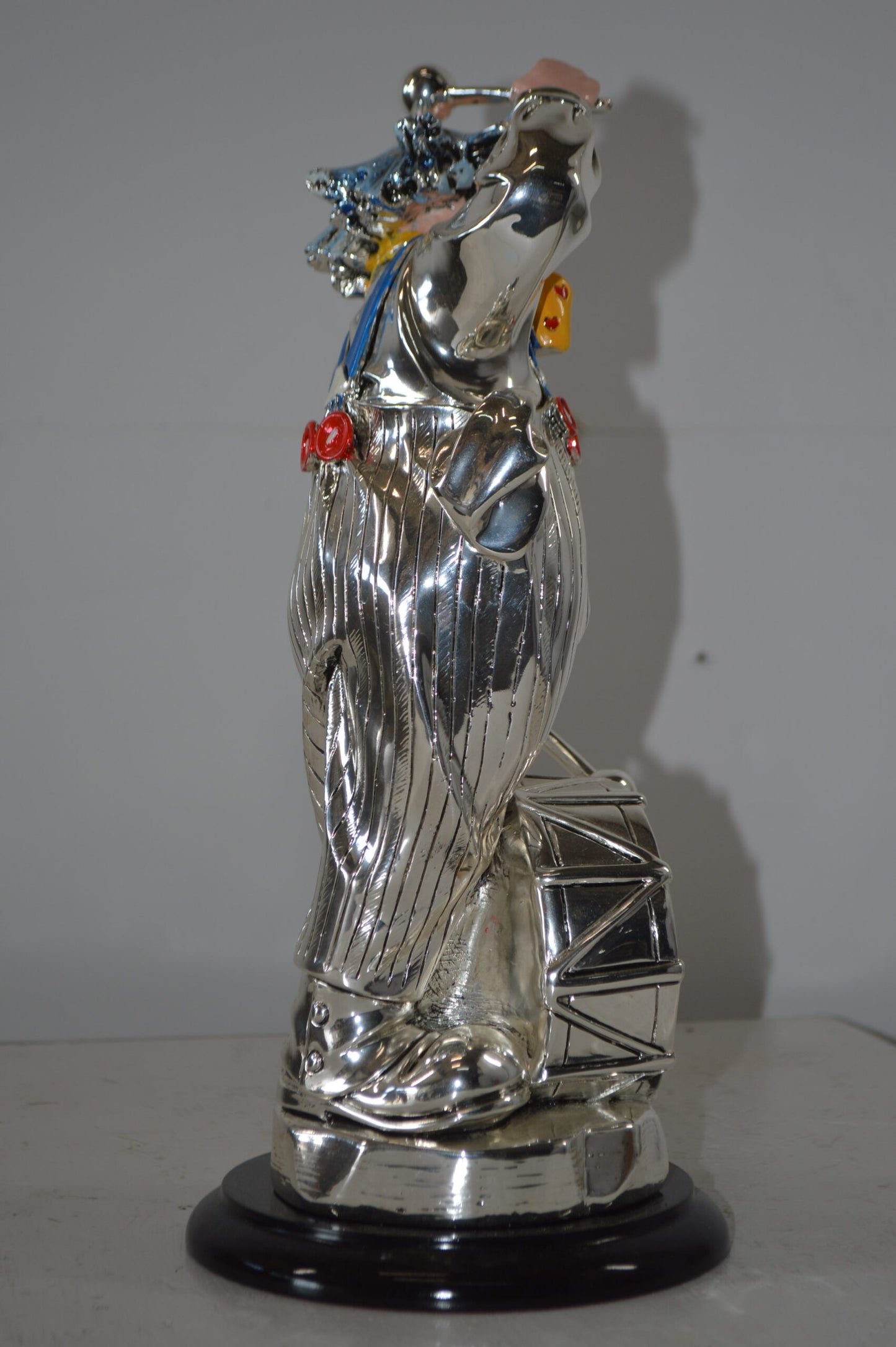 Clown Plays the Drams Resin Statue Silver finish - Size: 6"L x 6"W x 16"H.