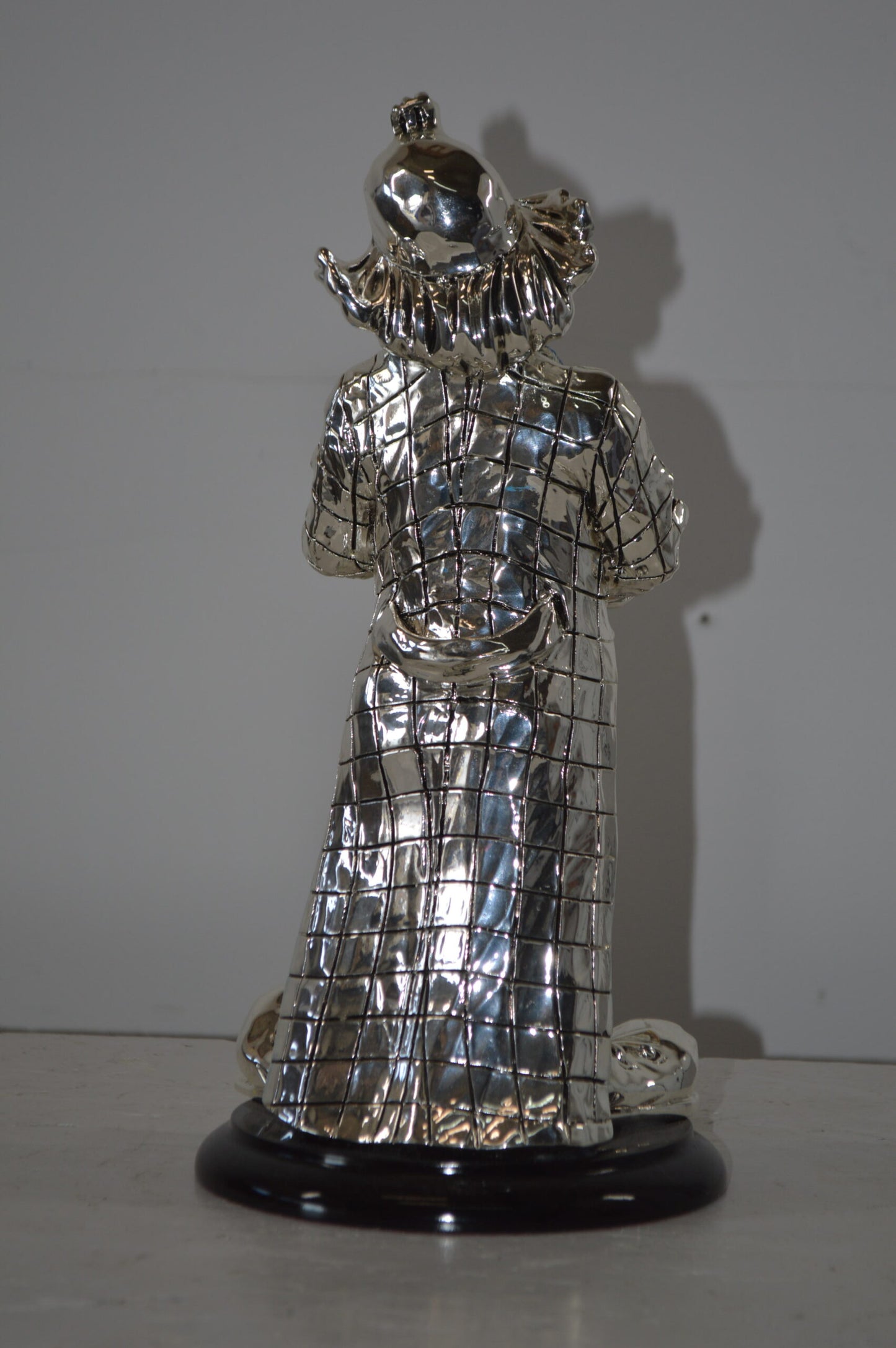 Clown Plays the Saxophone Resin Statue Silver finish - Size: 6"L x 6"W x 14"H.