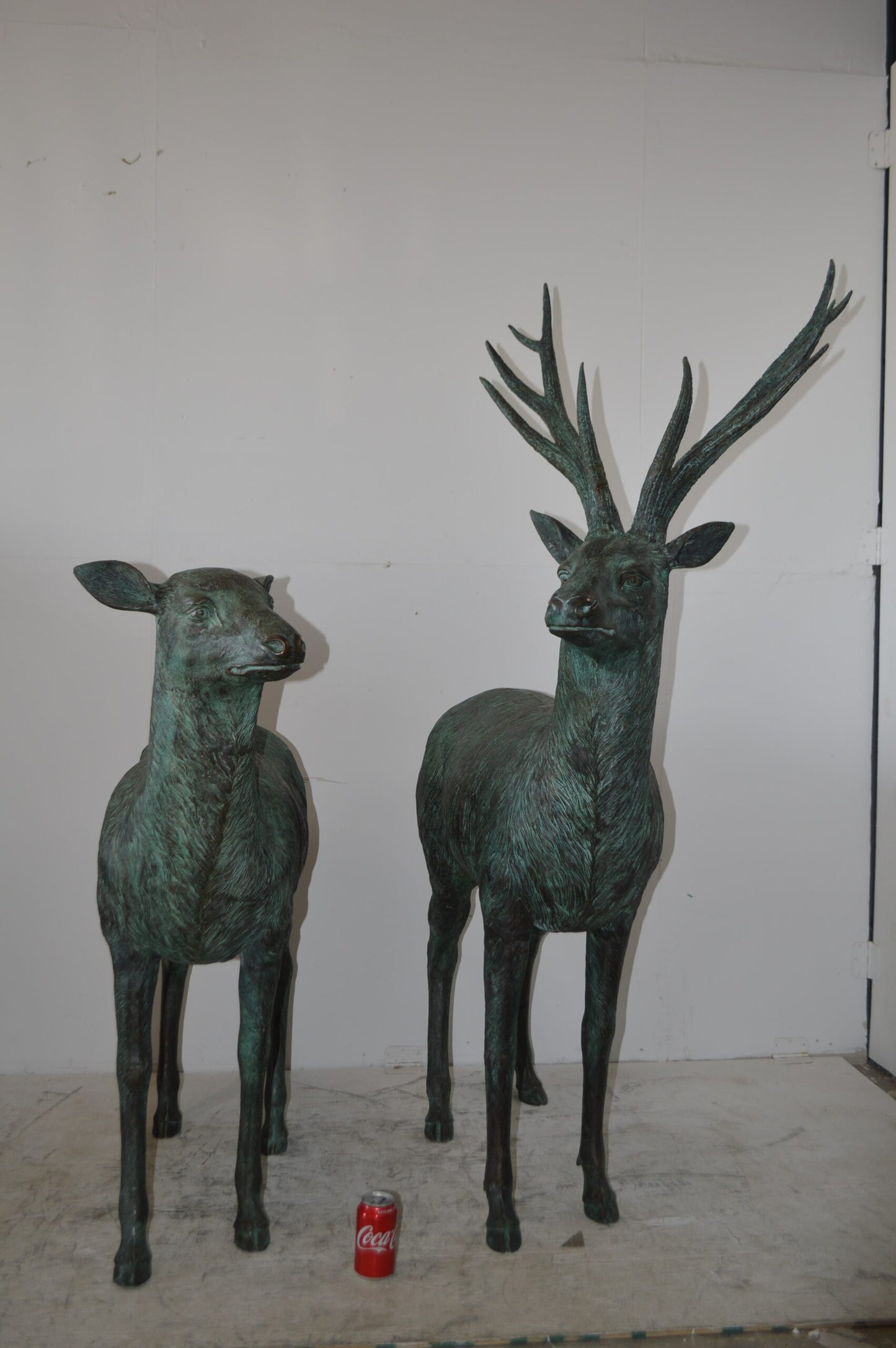 Pair of life size deer bronze statue with Green Patina - Size: 17" x 44" x 52"H.