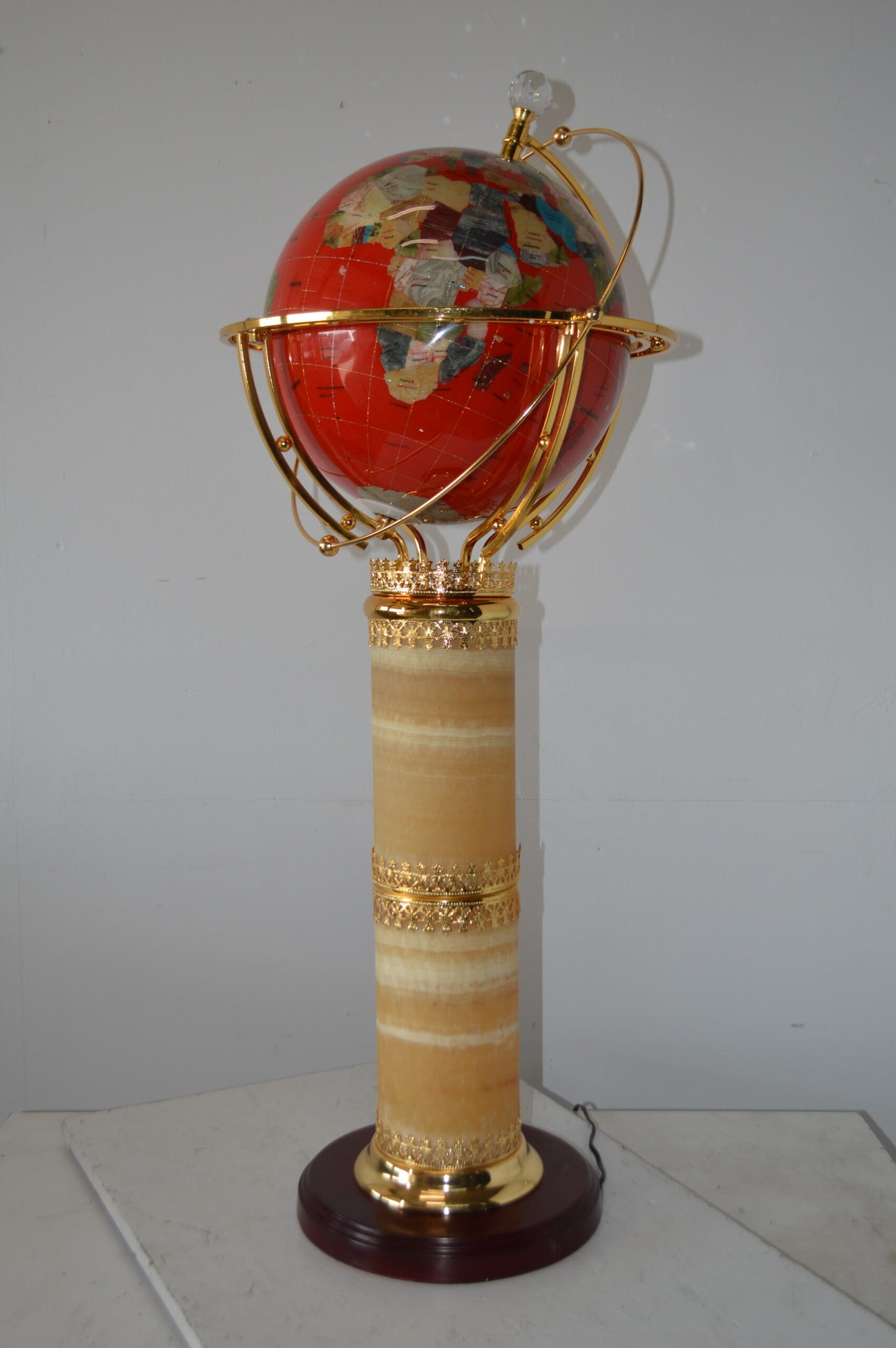Illuminated Red - World Globe Rotated by a Motor - Size: 19"L x 19"W x 42"H.