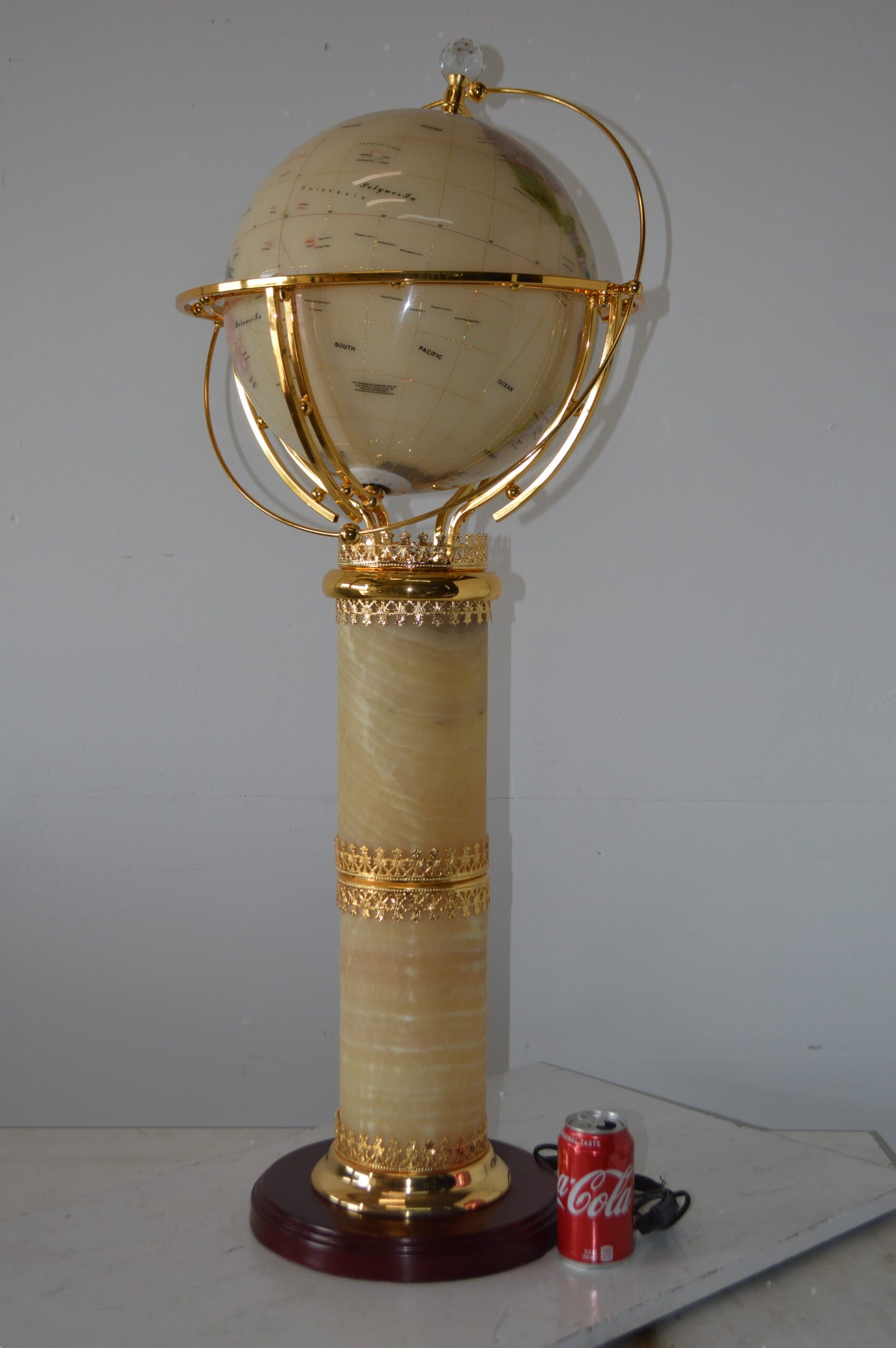 Illuminated White - World Globe Rotated by a Motor - Size: 19"L x 19"W x 42"H.