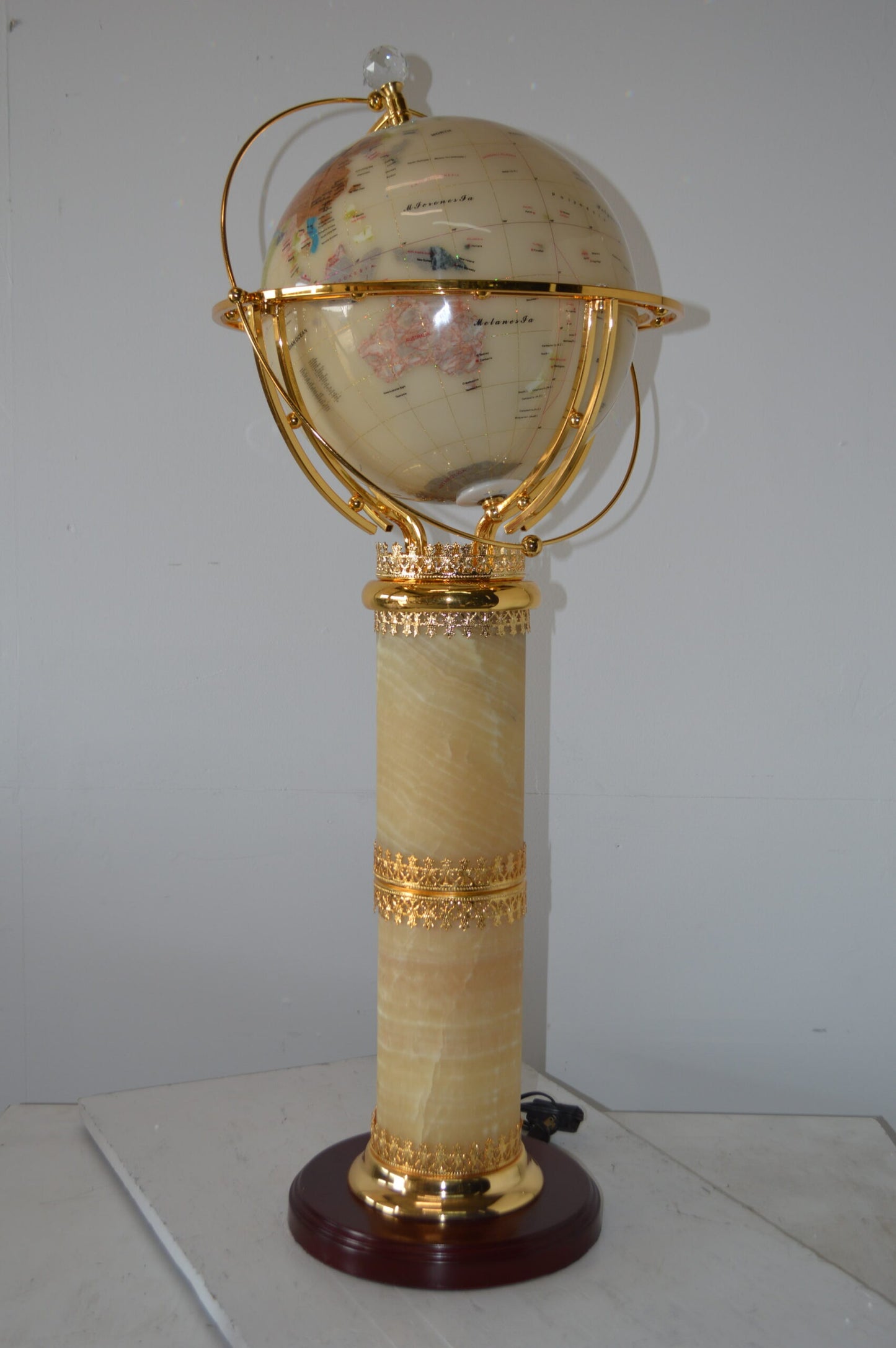 Illuminated White - World Globe Rotated by a Motor - Size: 19"L x 19"W x 42"H.