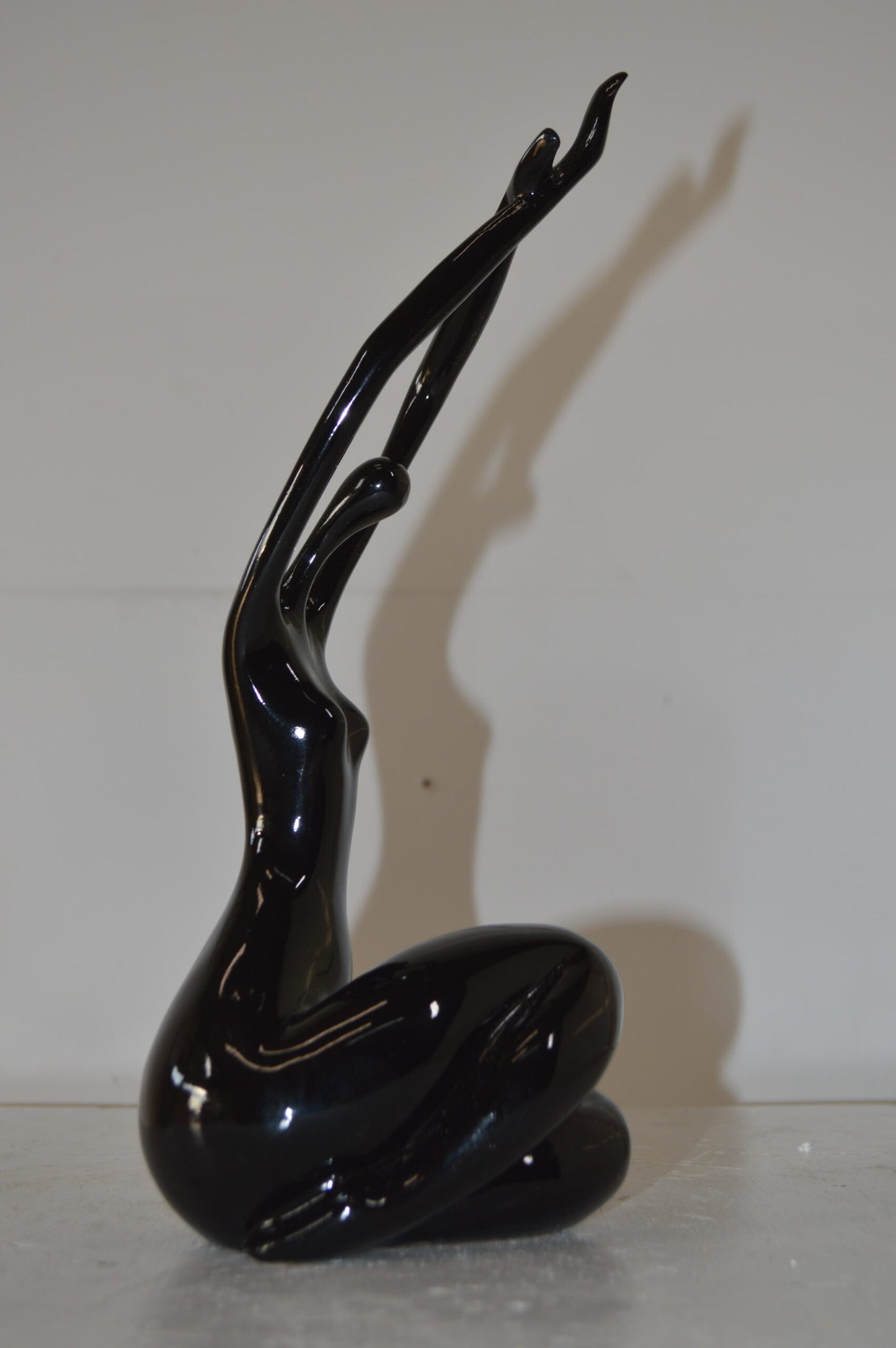 Modern Art Dancer in Action black Resin Statue - Size: 4"L x 6"W x 13"H.