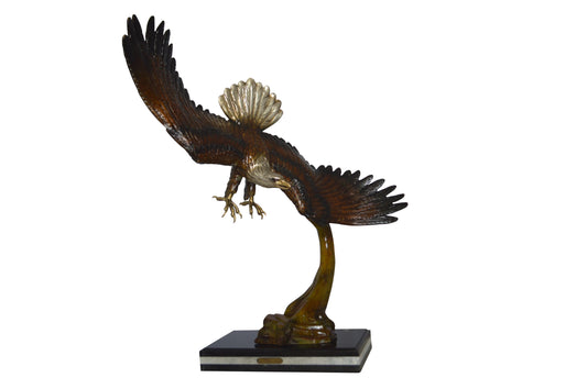 Eagle Soaring Bronze Statue by W Aribu -  Size: 35"L x 27"W x 38"H.