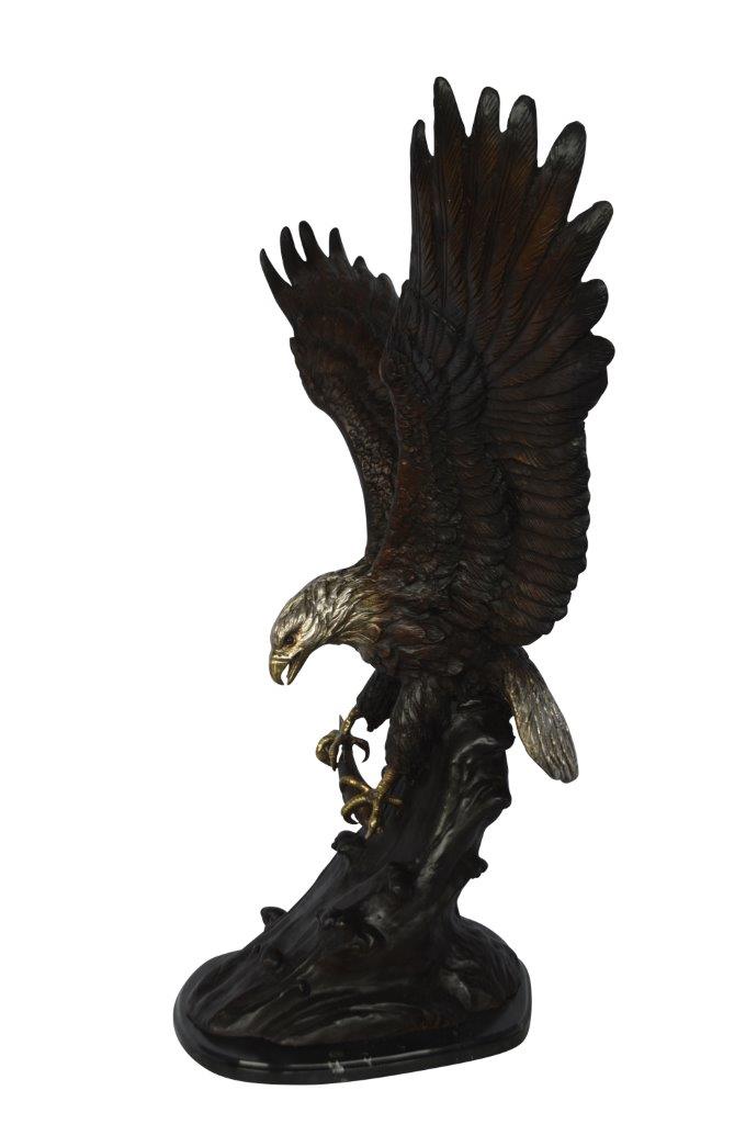 Eagle perched bronze statue - Size: 28"L x 18"W x 41"H.