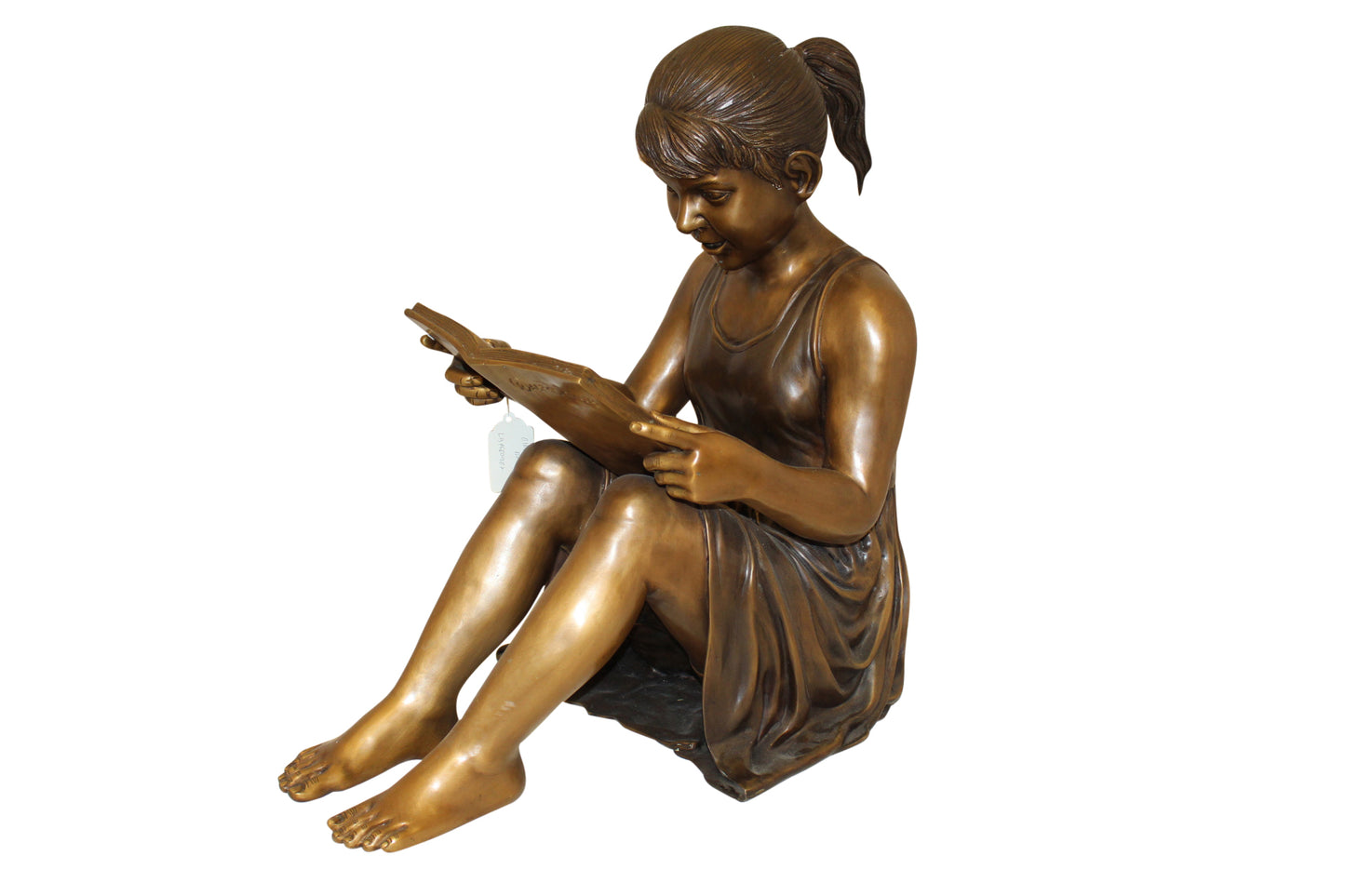 Girl Sitting and Reading a Book Bronze Statue - Size: 23"L x 15"W x 24"H.