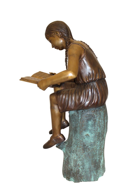 Girl Sitting on a Tree Stump Reading a Book Bronze Statue - 15"L x 17"W x 38"H