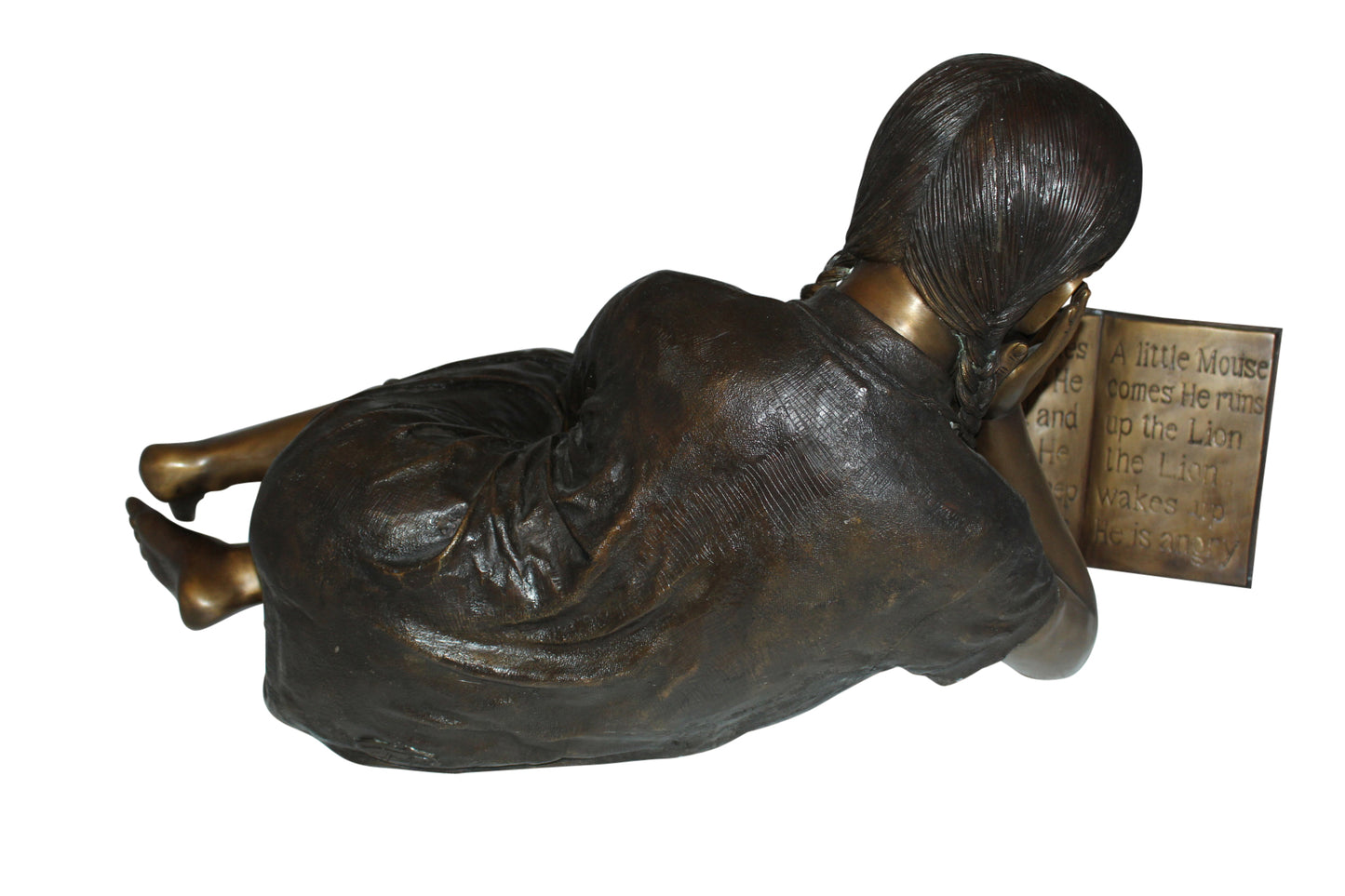Girl laying reading a book Bronze Statue - Size: 36"L x 17"W x 18"H.