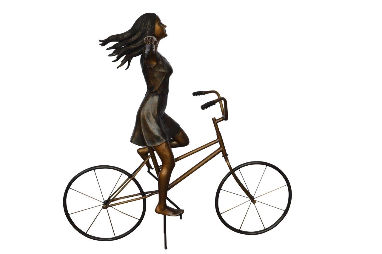 Girl Riding Hands Free life Size Bronze Statue - Size: 53"L x 62"W x 61"H.