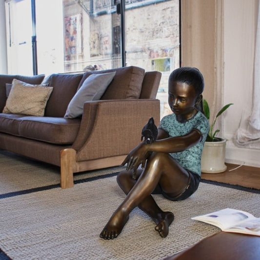 Girl Sitting with A Bird on Her Hand Bronze Statue Size: 23" x 13" x 21"H