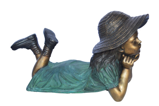 Girl Wearing A Hat Lying on Stomach Bronze Statue -  Size: 33"L x 17"W x 17"H.