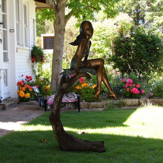 Girl on Maple Leaf Bronze Statue - Size: 23"L x 18"W x 44"H.