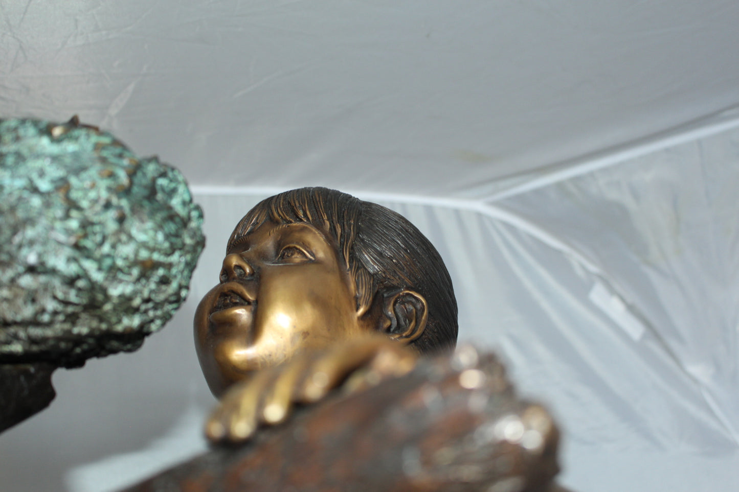 Two Kids Climbing on a Tree Bronze Statue - Size: 17"L x 17"W x 46"H.