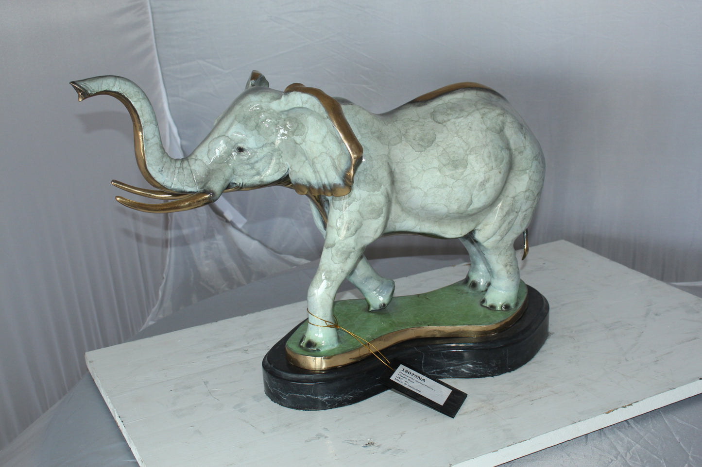 Elephant Medium Bronze Statue -  Size: 26"L x 8"W x 17"H.