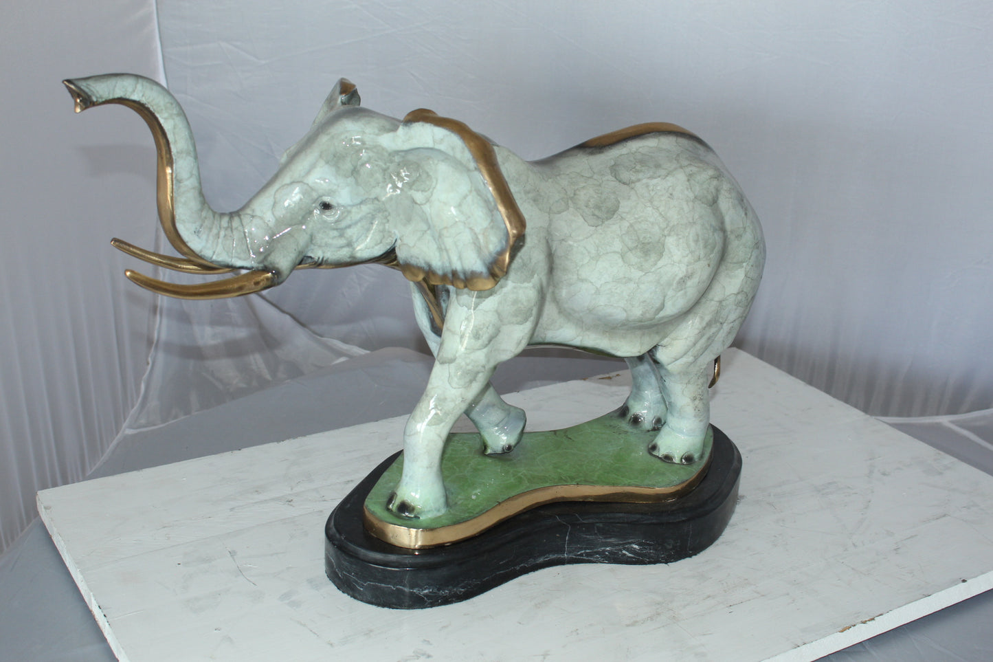 Elephant Medium Bronze Statue -  Size: 26"L x 8"W x 17"H.