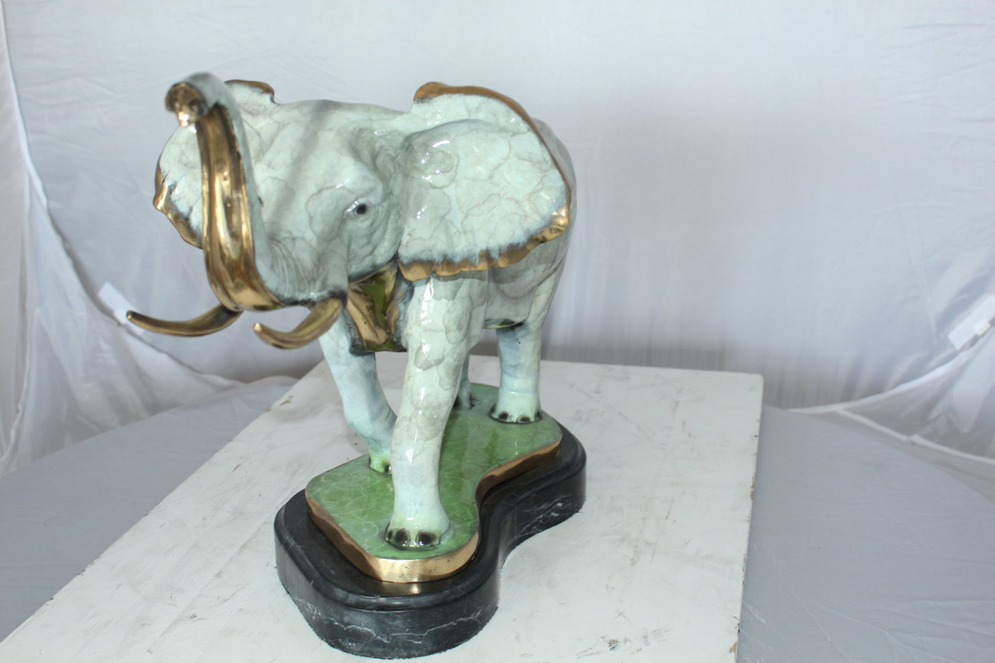 Elephant Medium Bronze Statue -  Size: 26"L x 8"W x 17"H.