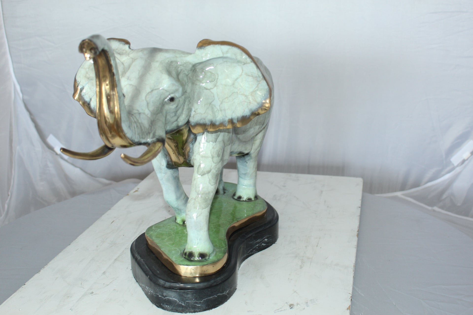Elephant Medium Bronze Statue -  Size: 26"L x 8"W x 17"H.