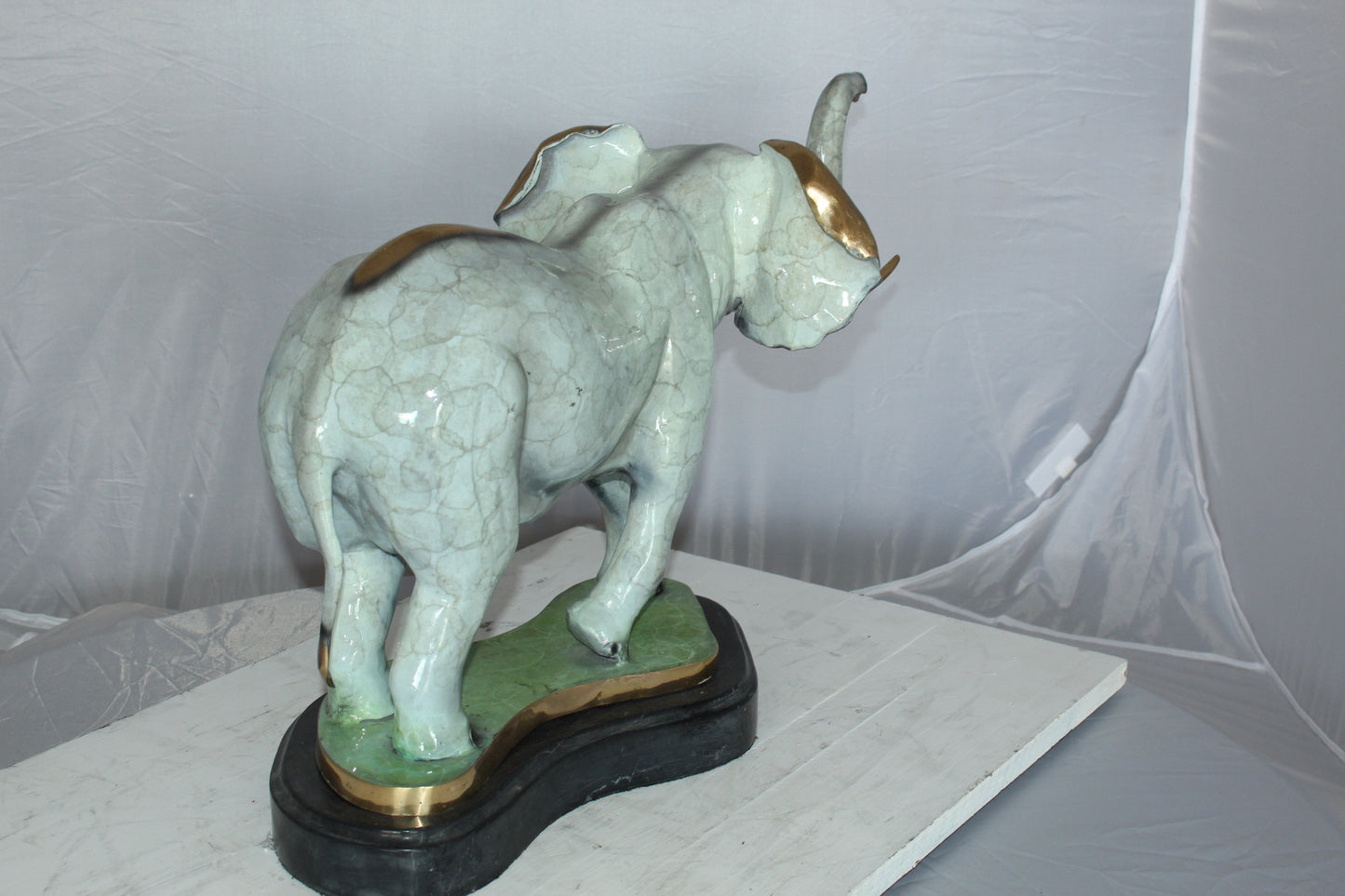 Elephant Medium Bronze Statue -  Size: 26"L x 8"W x 17"H.