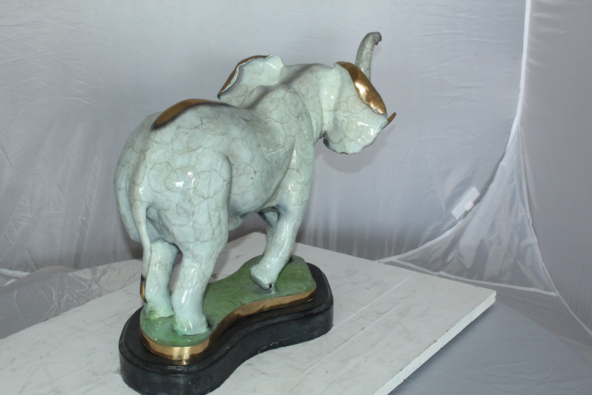 Elephant Medium Bronze Statue -  Size: 26"L x 8"W x 17"H.