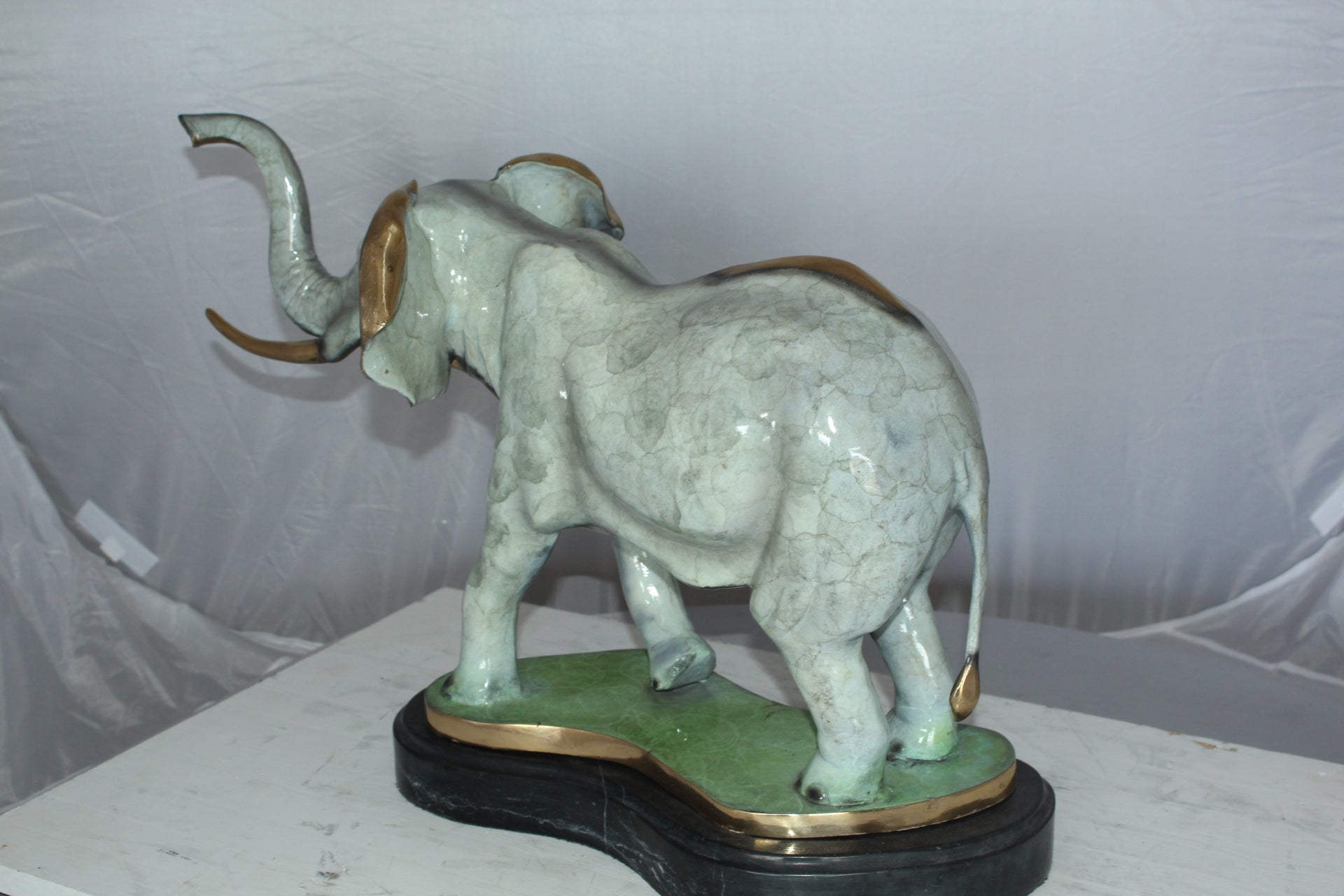 Elephant Medium Bronze Statue -  Size: 26"L x 8"W x 17"H.