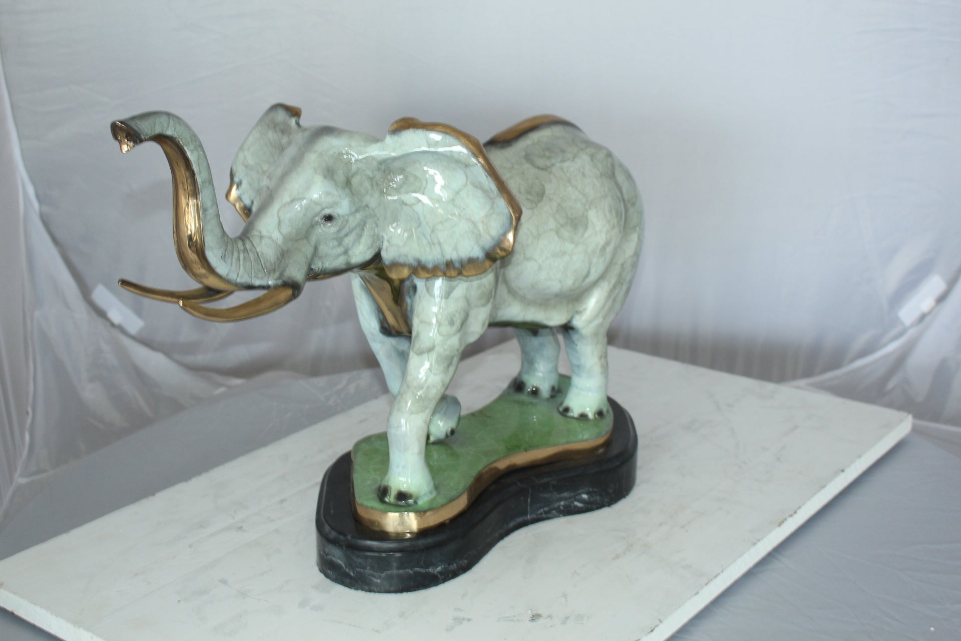 Elephant Medium Bronze Statue -  Size: 26"L x 8"W x 17"H.