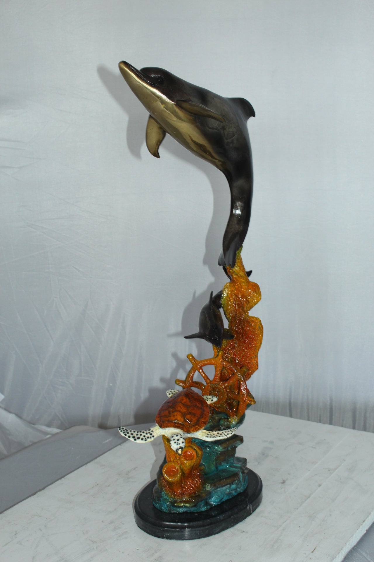 Two Dolphins with Turtle bronze statue - Size: 14"L x 8"W x 28"H.