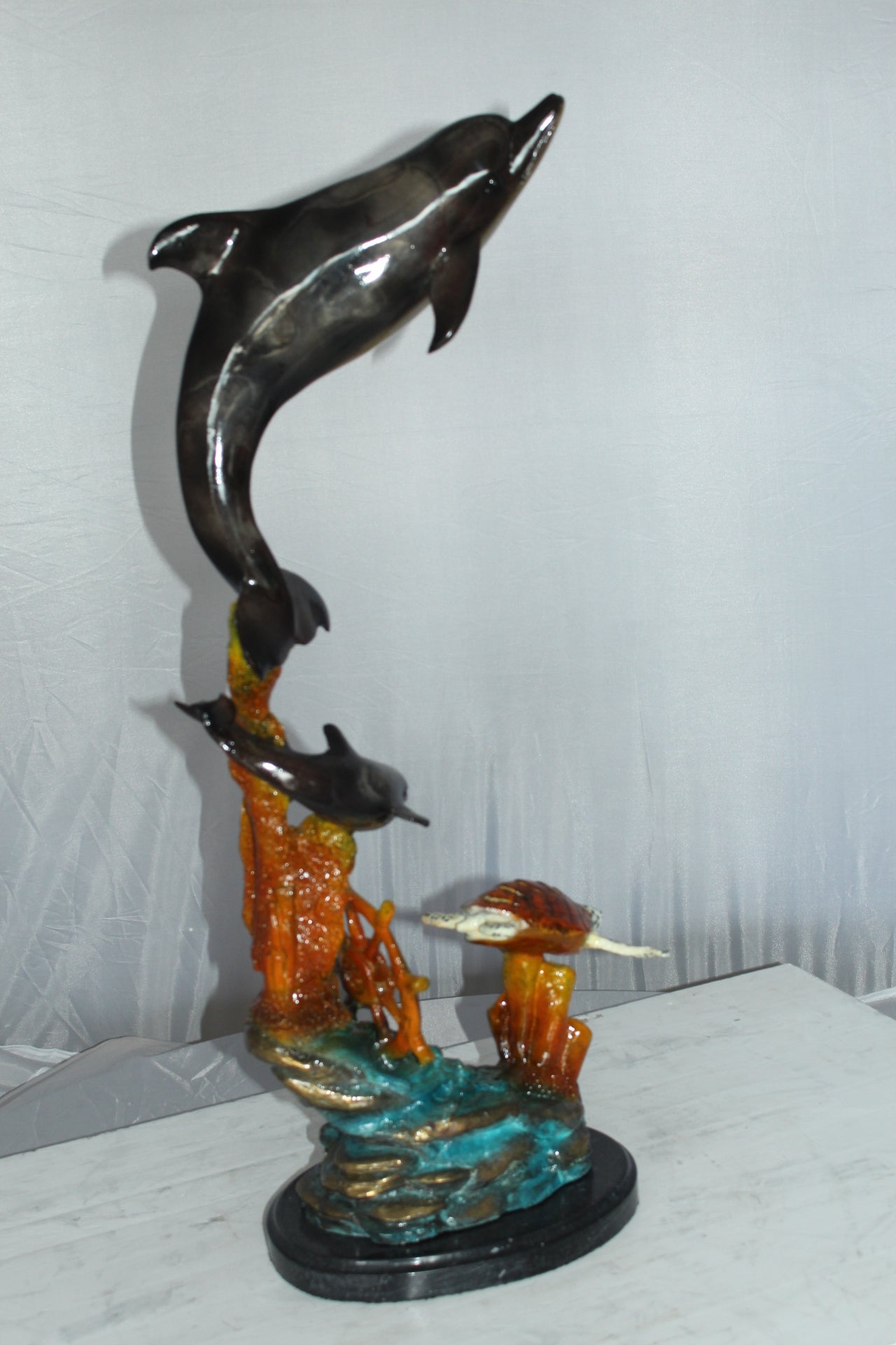Two Dolphins with Turtle bronze statue - Size: 14"L x 8"W x 28"H.