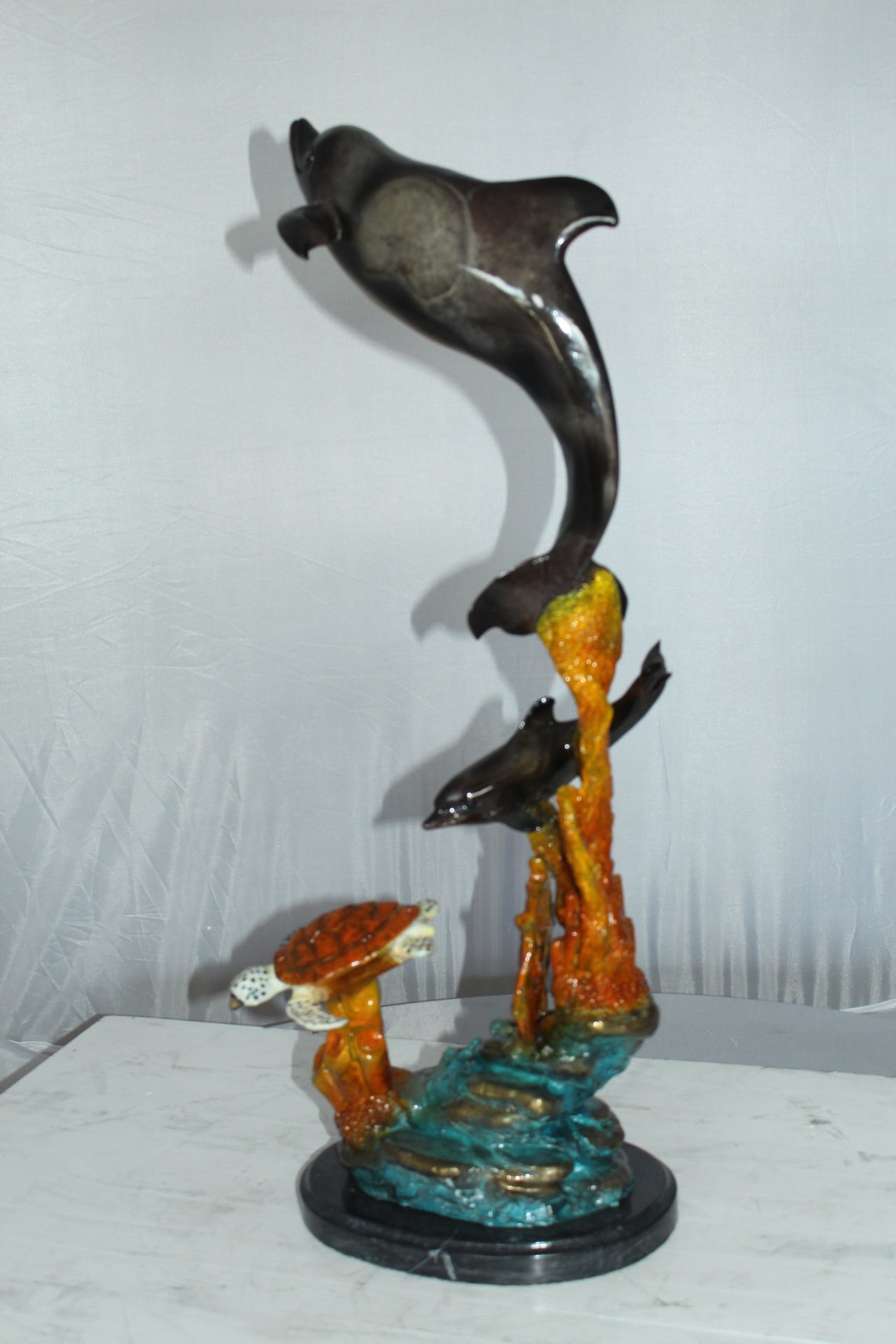Two Dolphins with Turtle bronze statue - Size: 14"L x 8"W x 28"H.