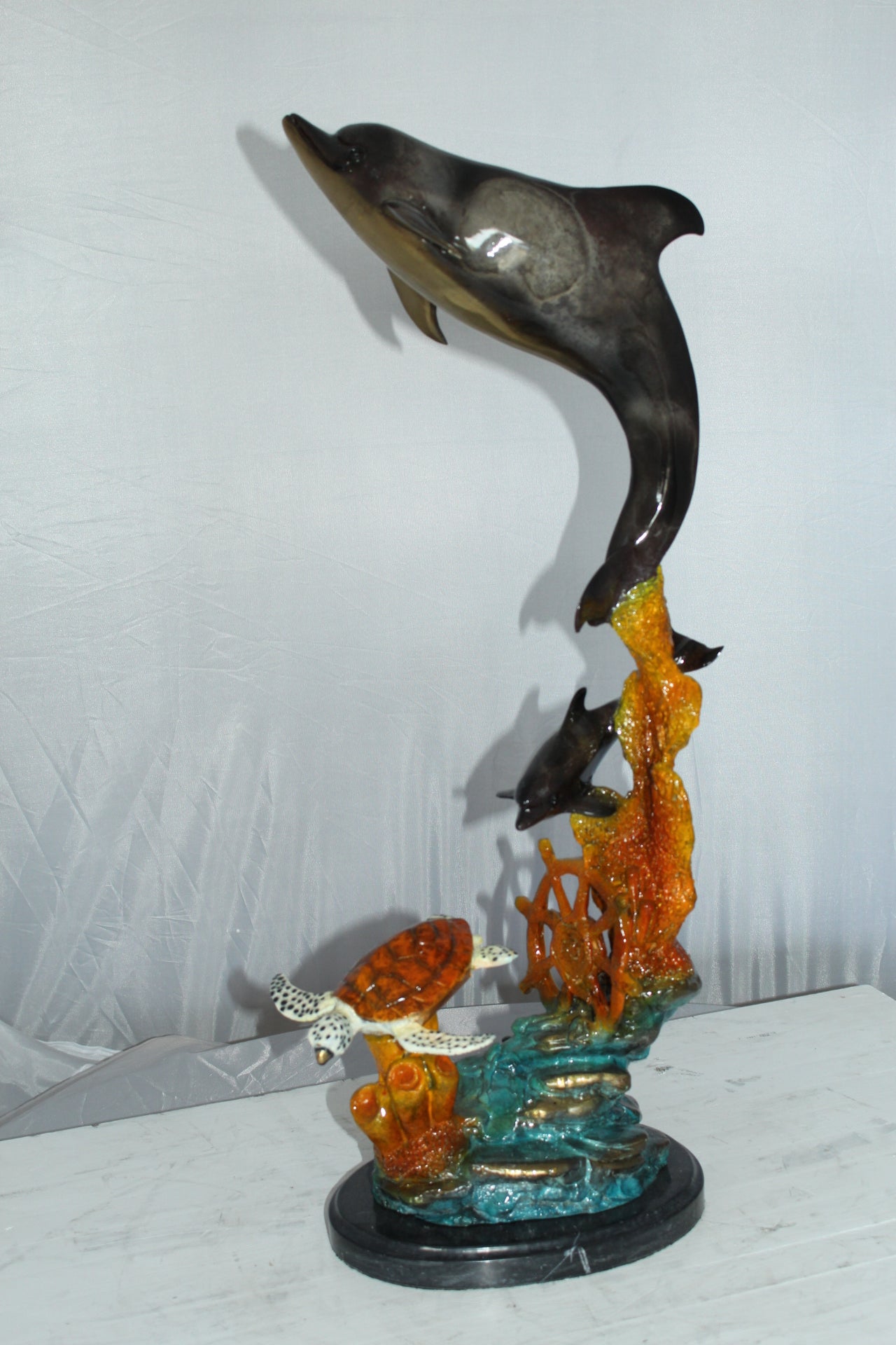 Two Dolphins with Turtle bronze statue - Size: 14"L x 8"W x 28"H.